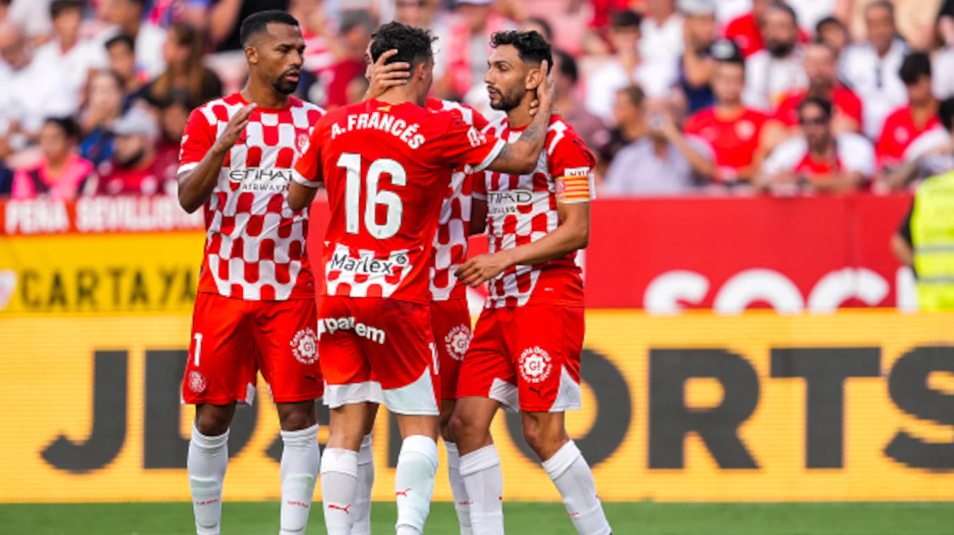 Girona ease to win at Sevilla