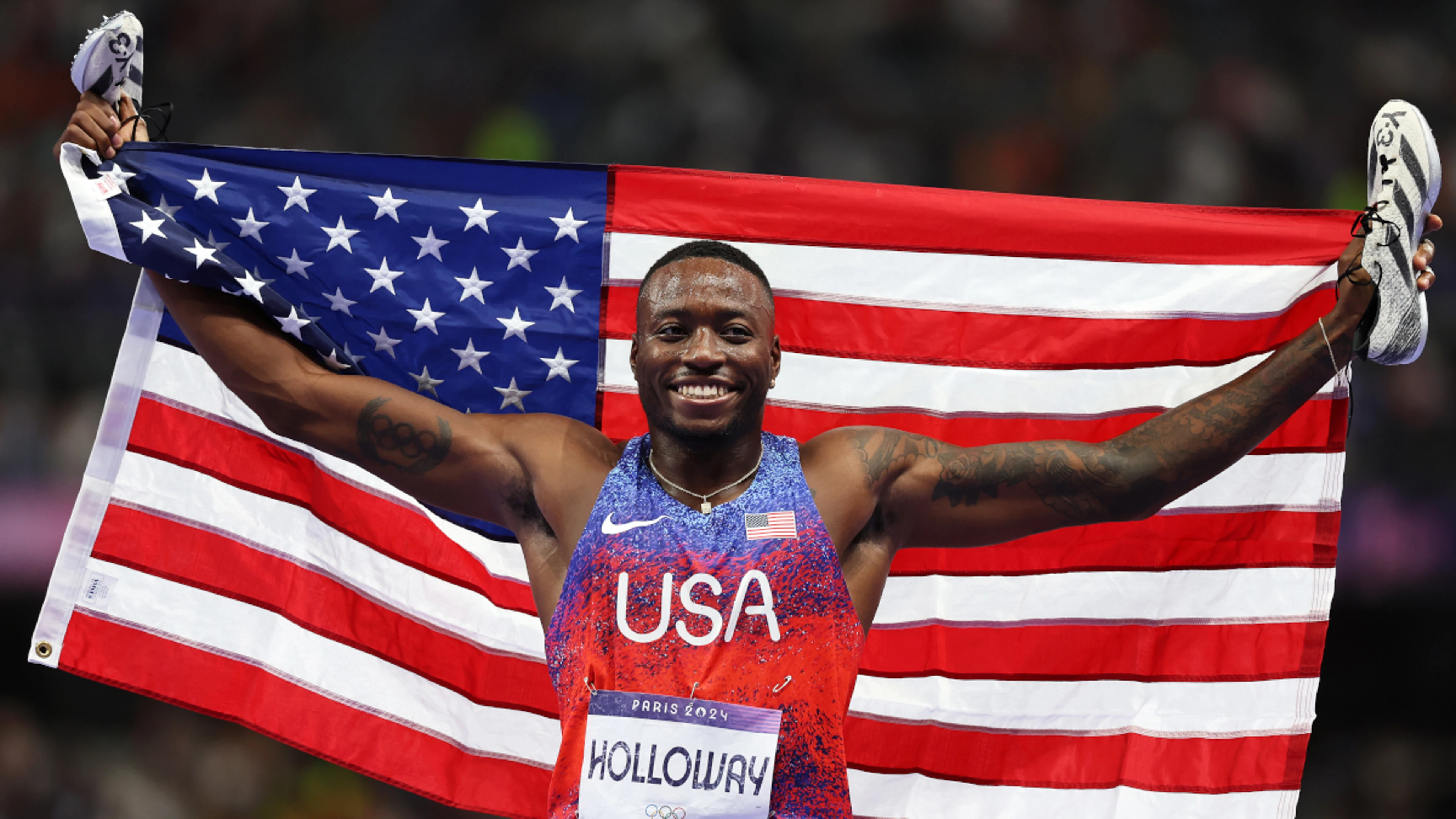 American Holloway wins Olympic men's 110m hurdles gold