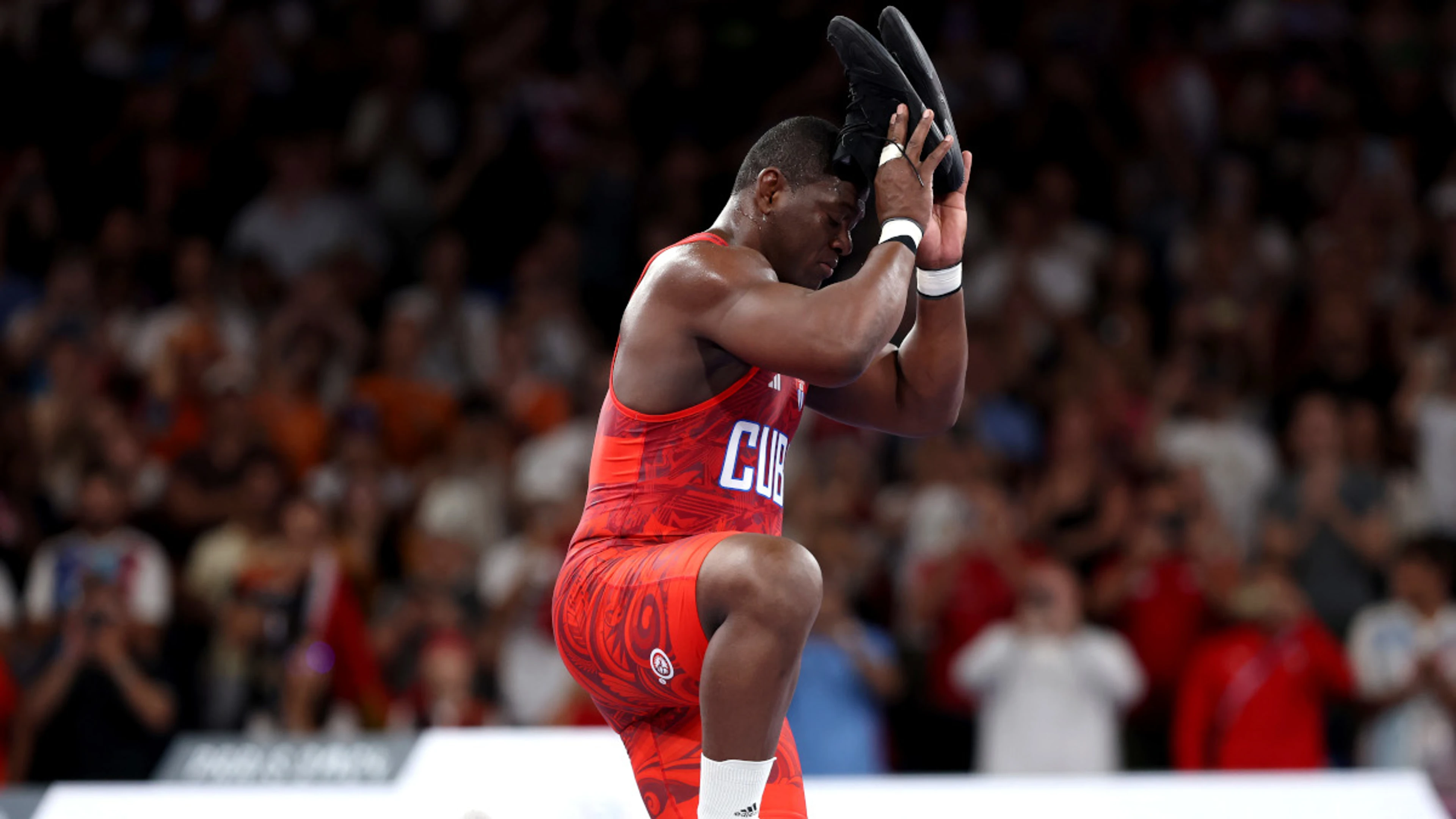 Wrestler Lopez puts Lewis, Phelps in shade with fifth successive Olympic gold