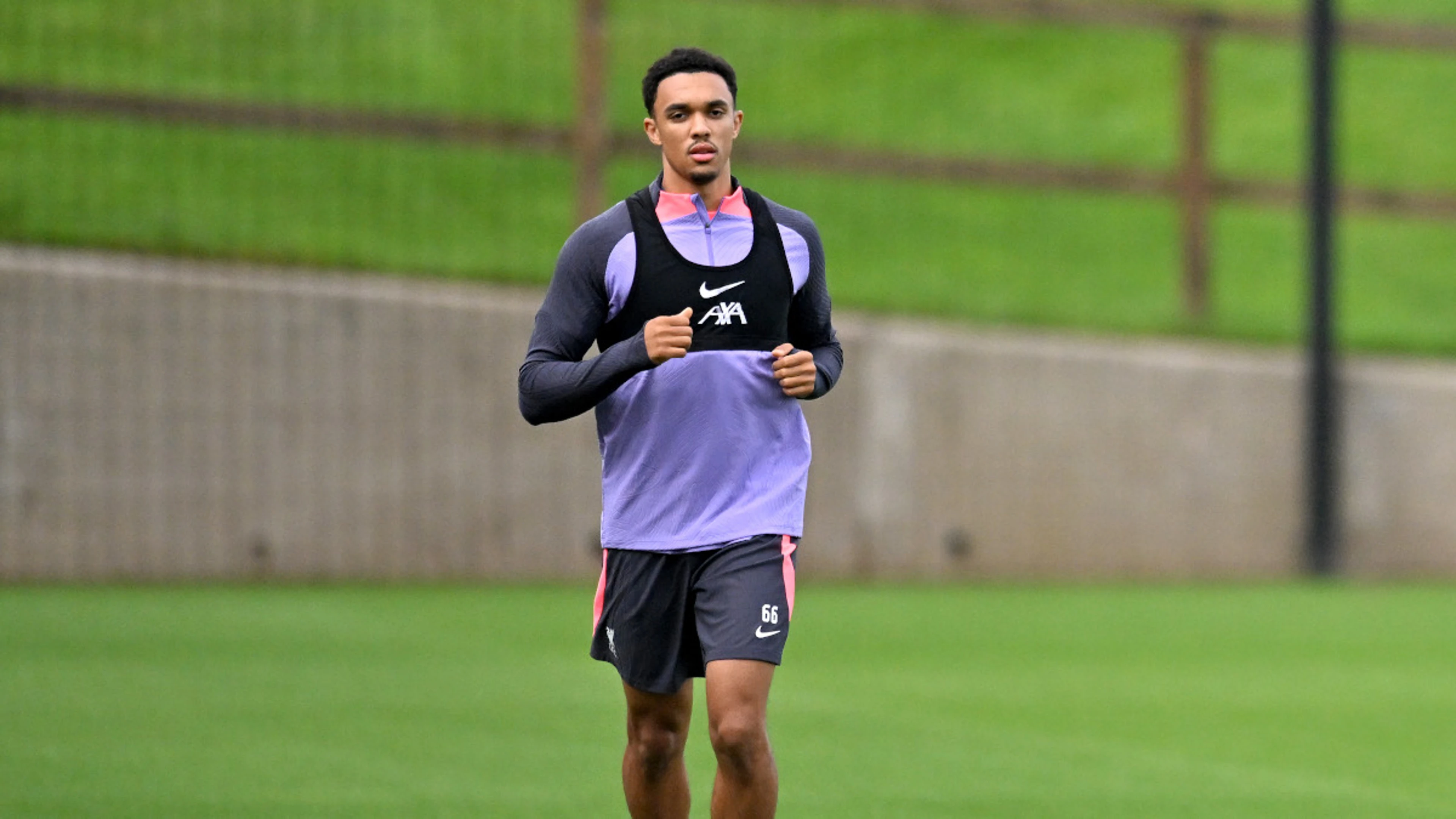 Arnold back in training with Liverpool