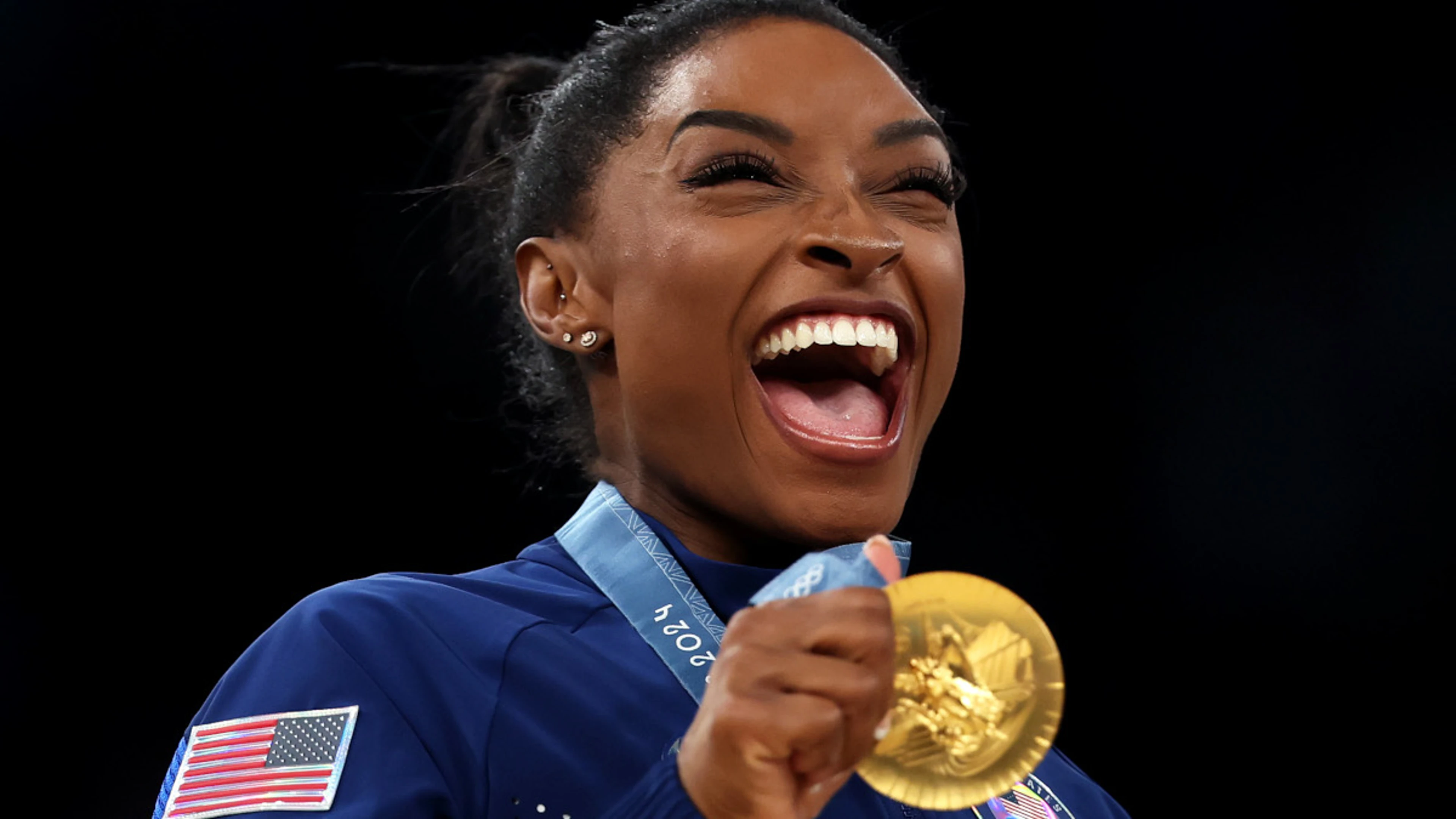 Biles stands head and shoulders above rivals after clinching all-around gold