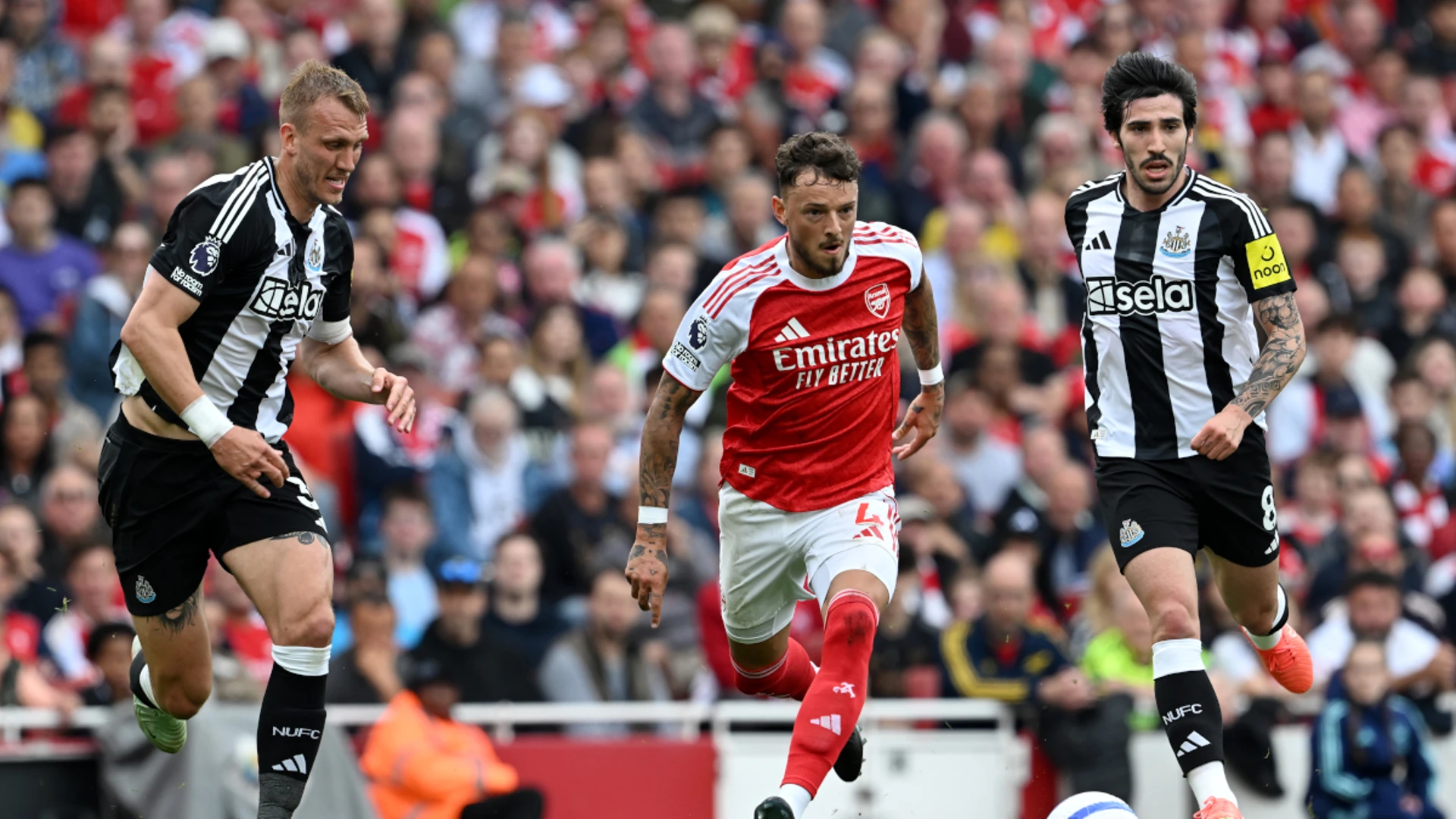Arsenal sink Newcastle to seal Champions League berth
