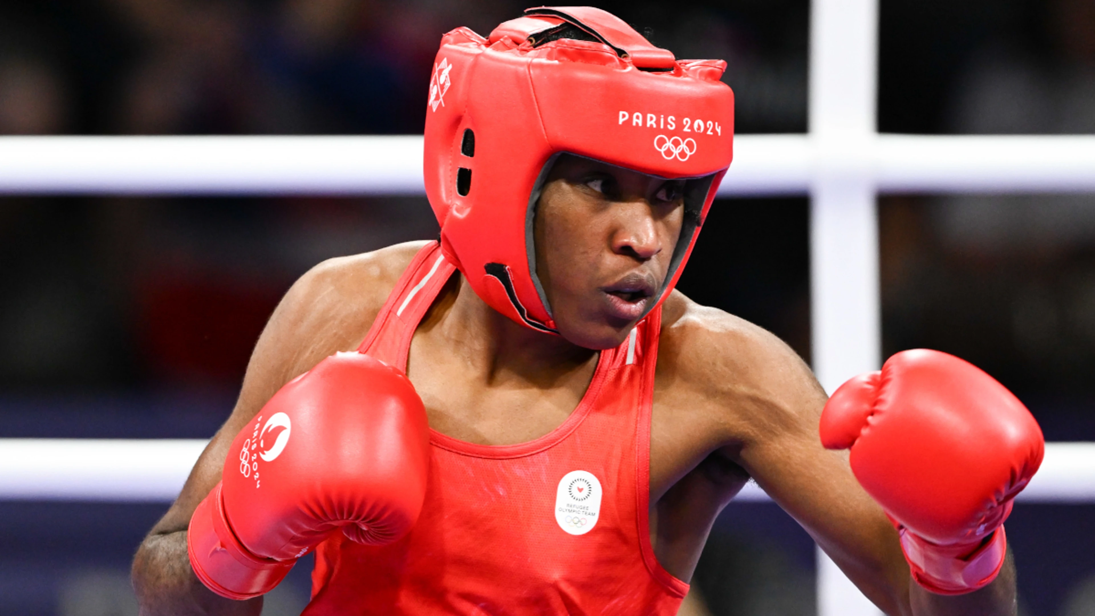 Boxer Ngamba wins Refugee Olympic Team's first medal ever