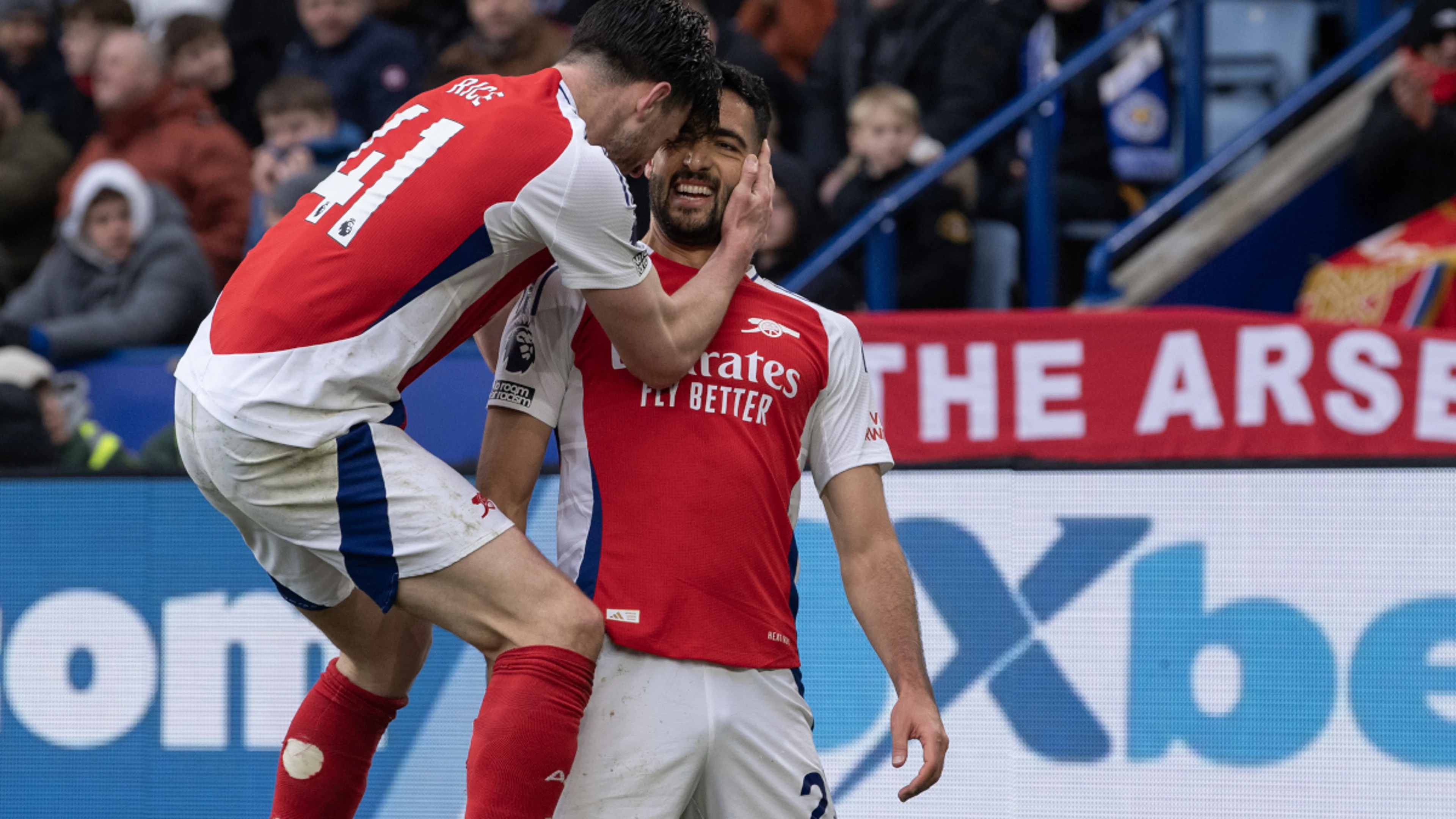 Arsenal close gap on leaders Liverpool, Marmoush treble lifts Man City