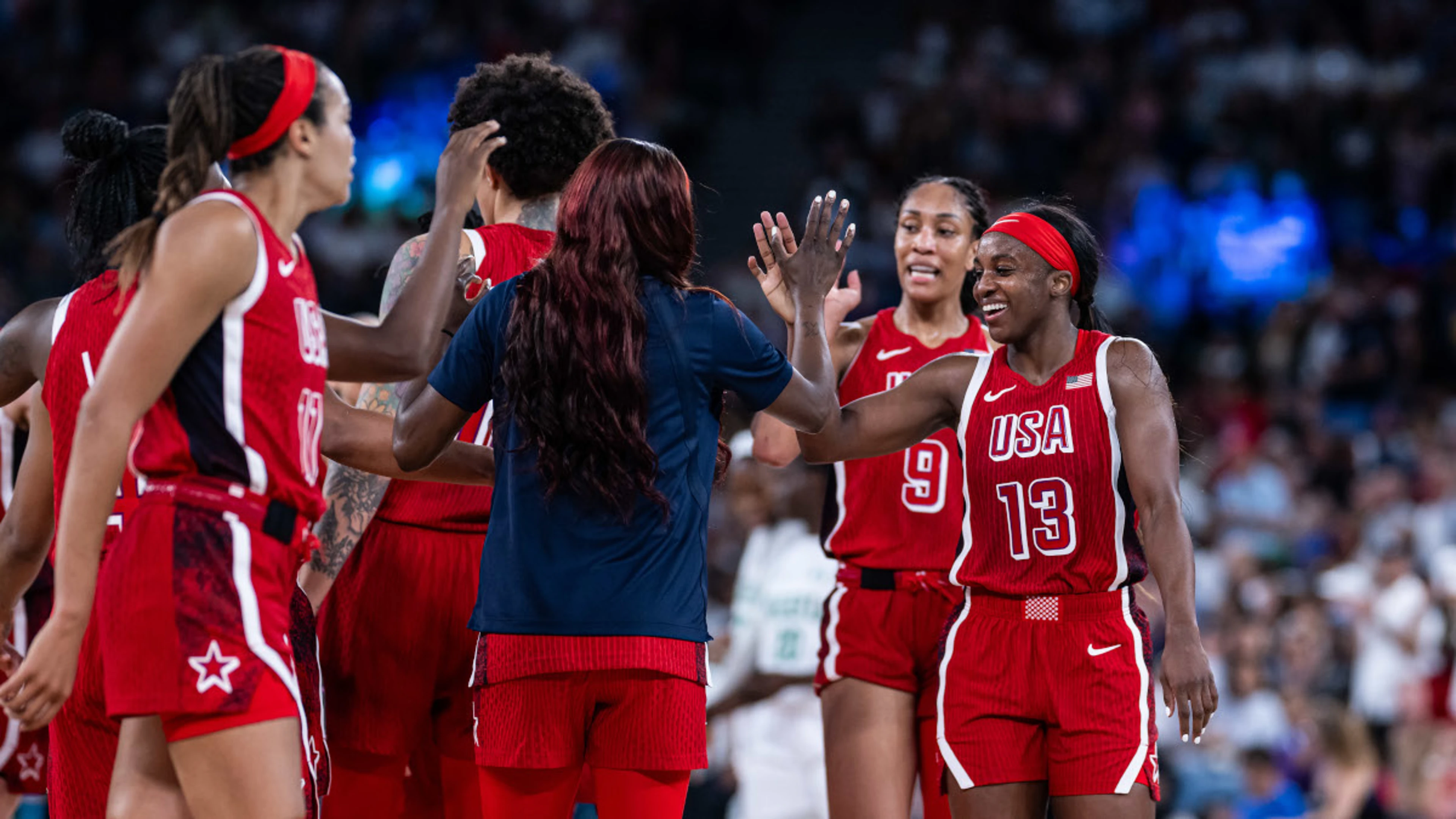 History seeking US women face old foes Australia in Olympic basketball semifinals