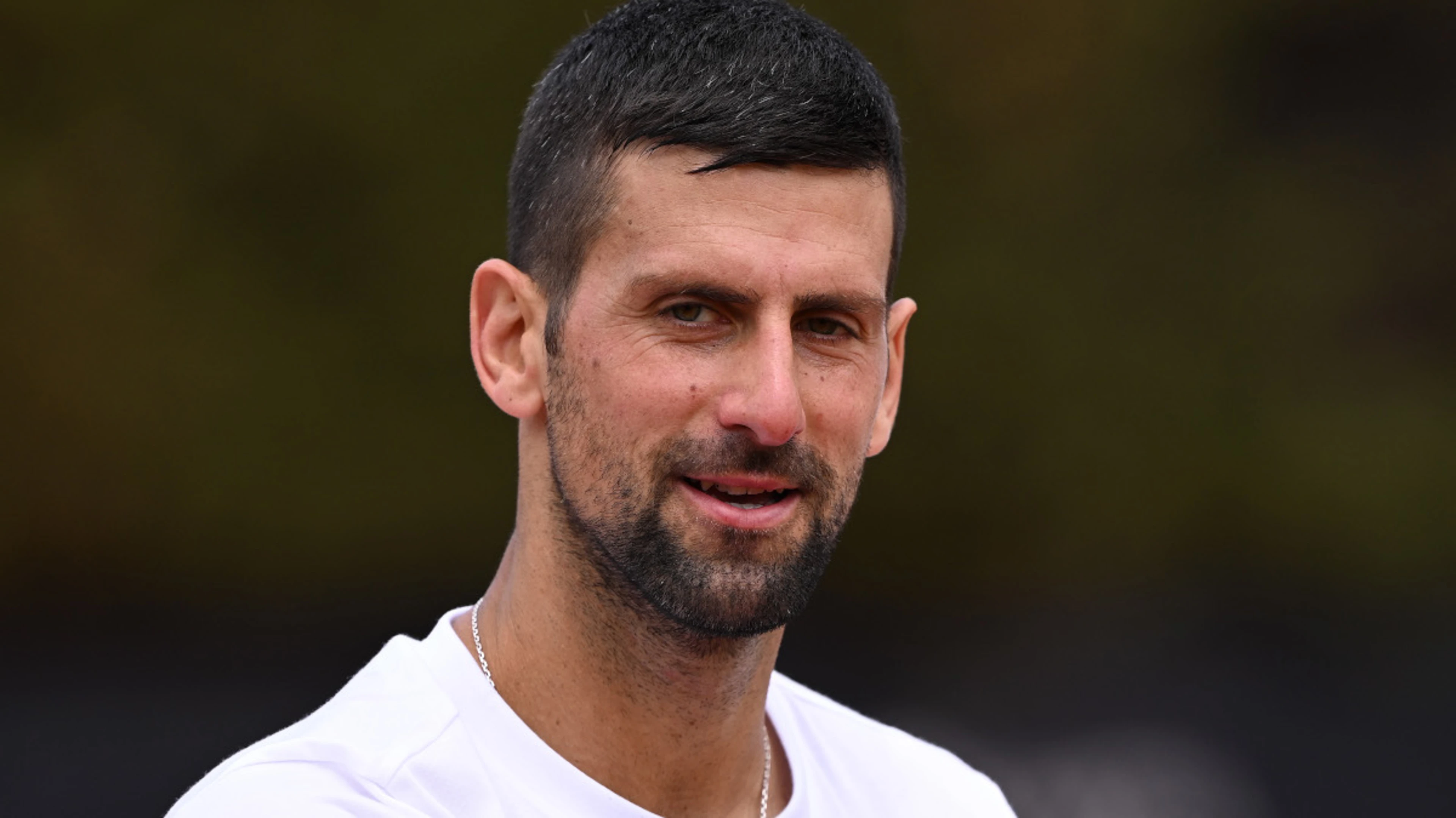 'Fine' Djokovic dons cycling crash helmet after Rome bottle drama