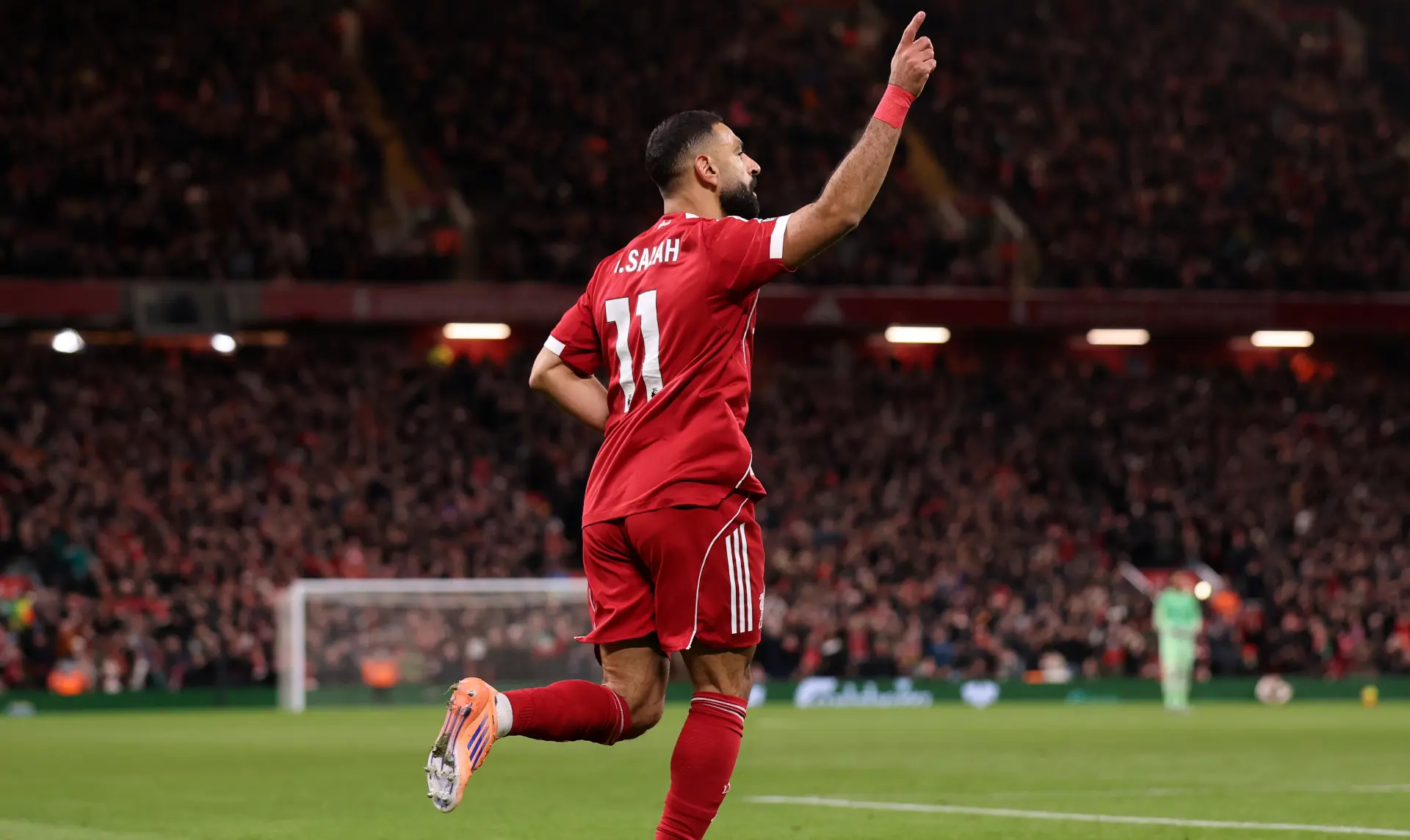 Salah back in Liverpool fold as Arsenal grab last-gasp win