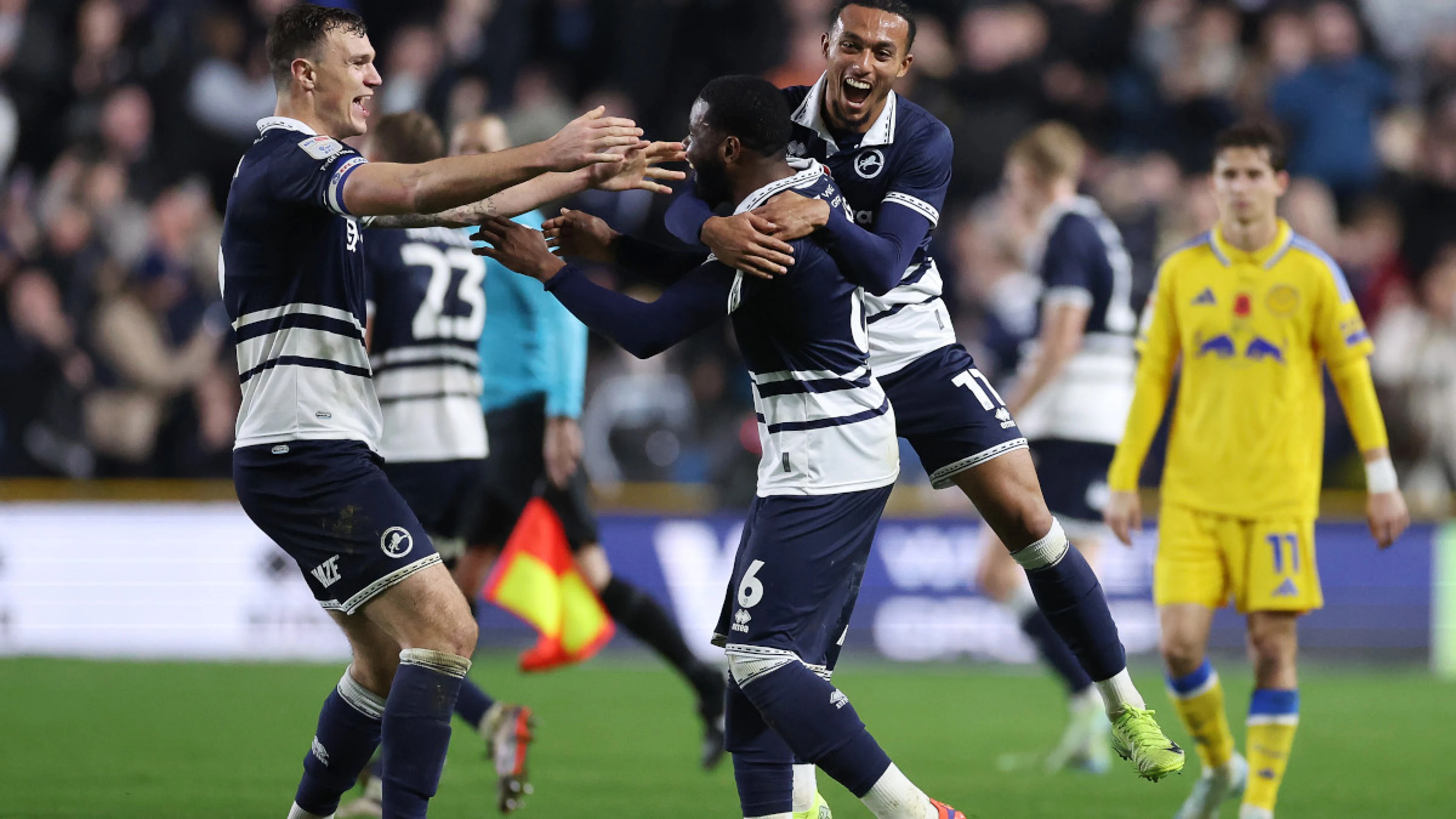 Millwall dent Leeds' promotion push