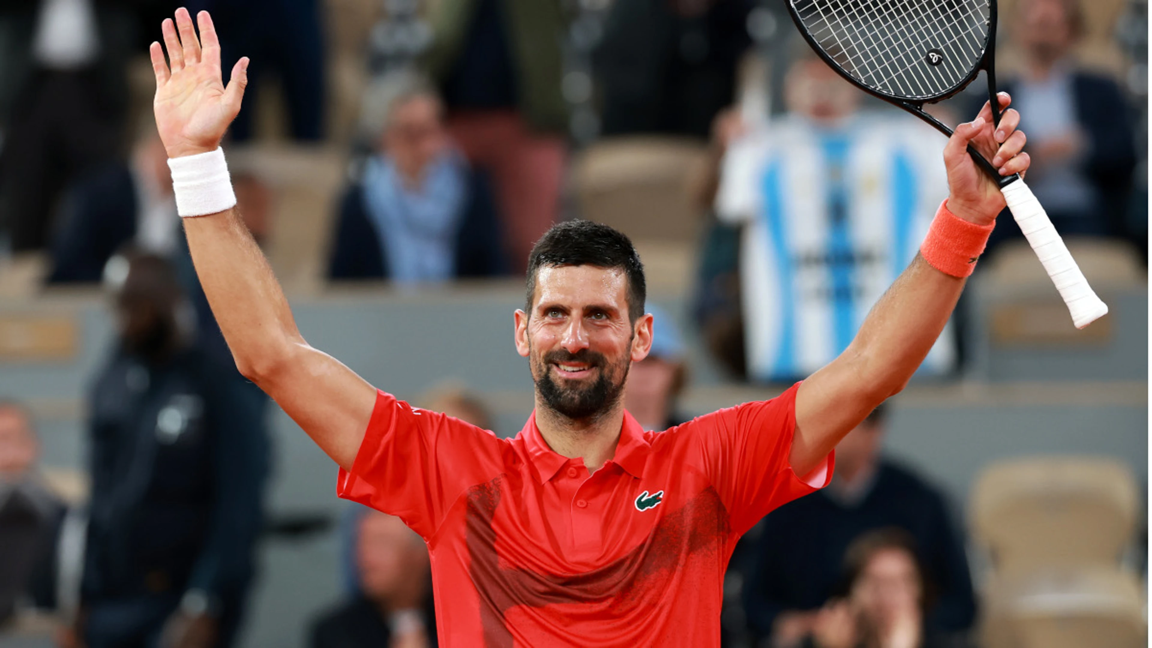 Djokovic cruises into French Open second round