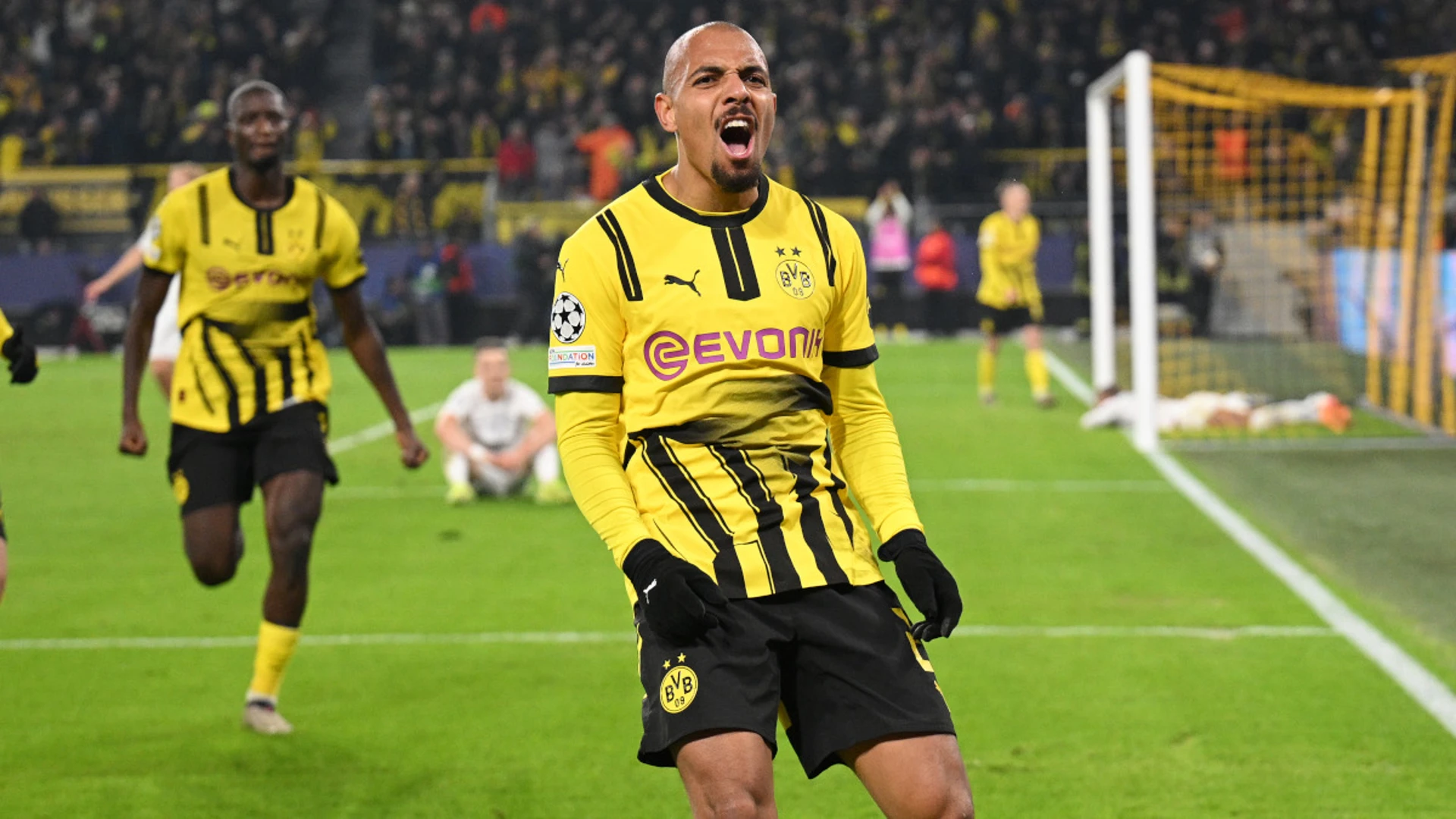 Substitute Malen's late strike lifts Dortmund past Sturm Graz