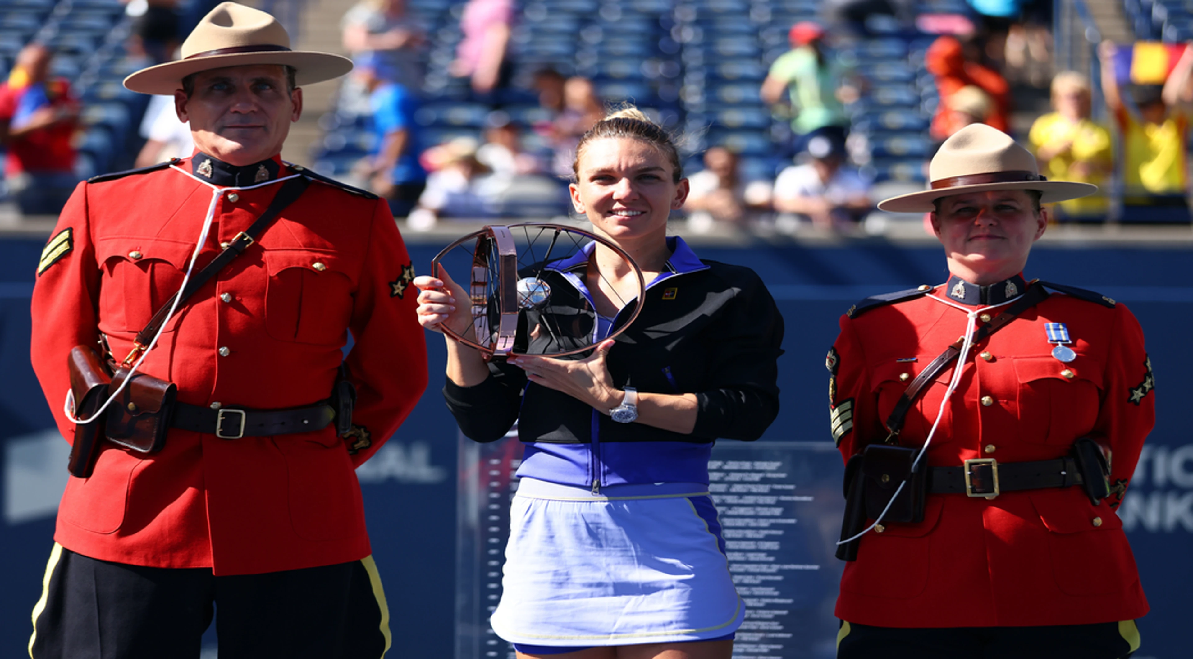 Halep holds off Haddad Maia to win third Canadian crown