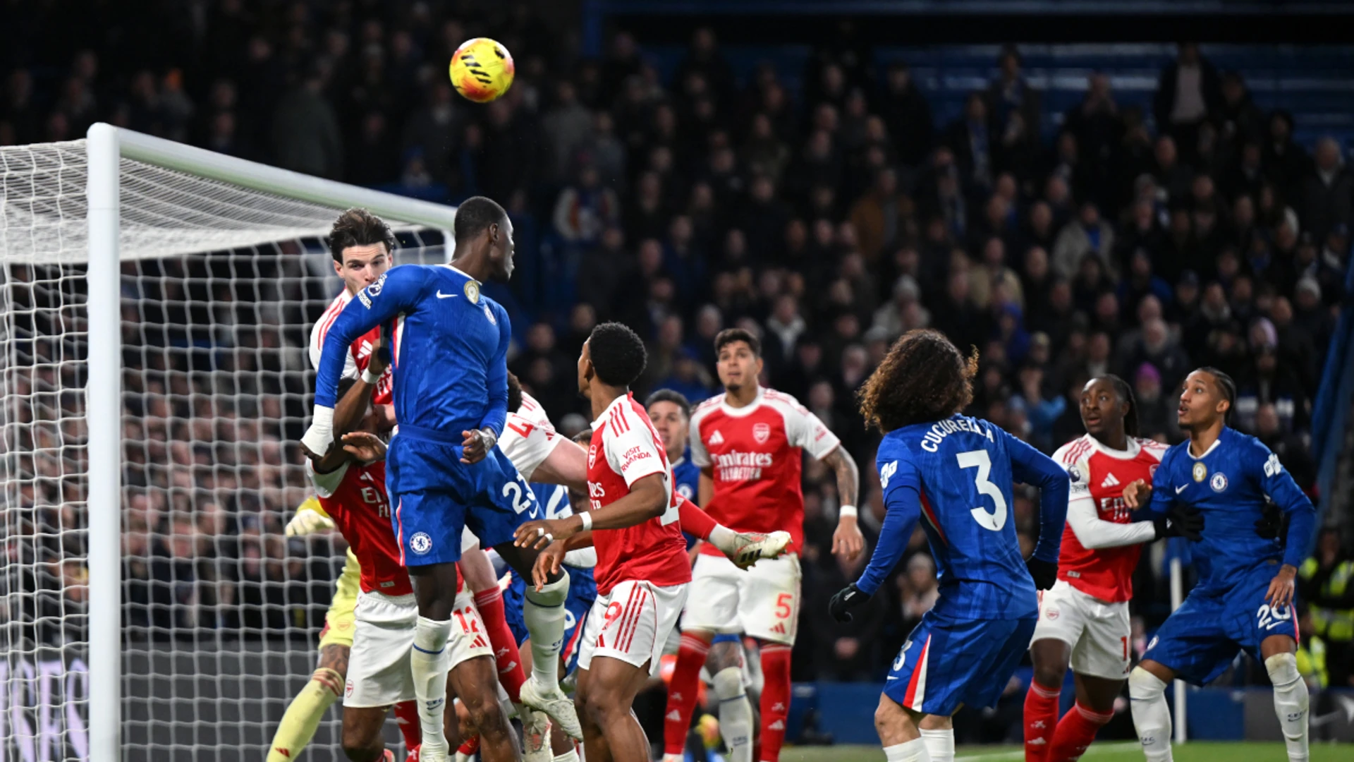 Merino strikes to give Arsenal bruising draw at 10-man Chelsea