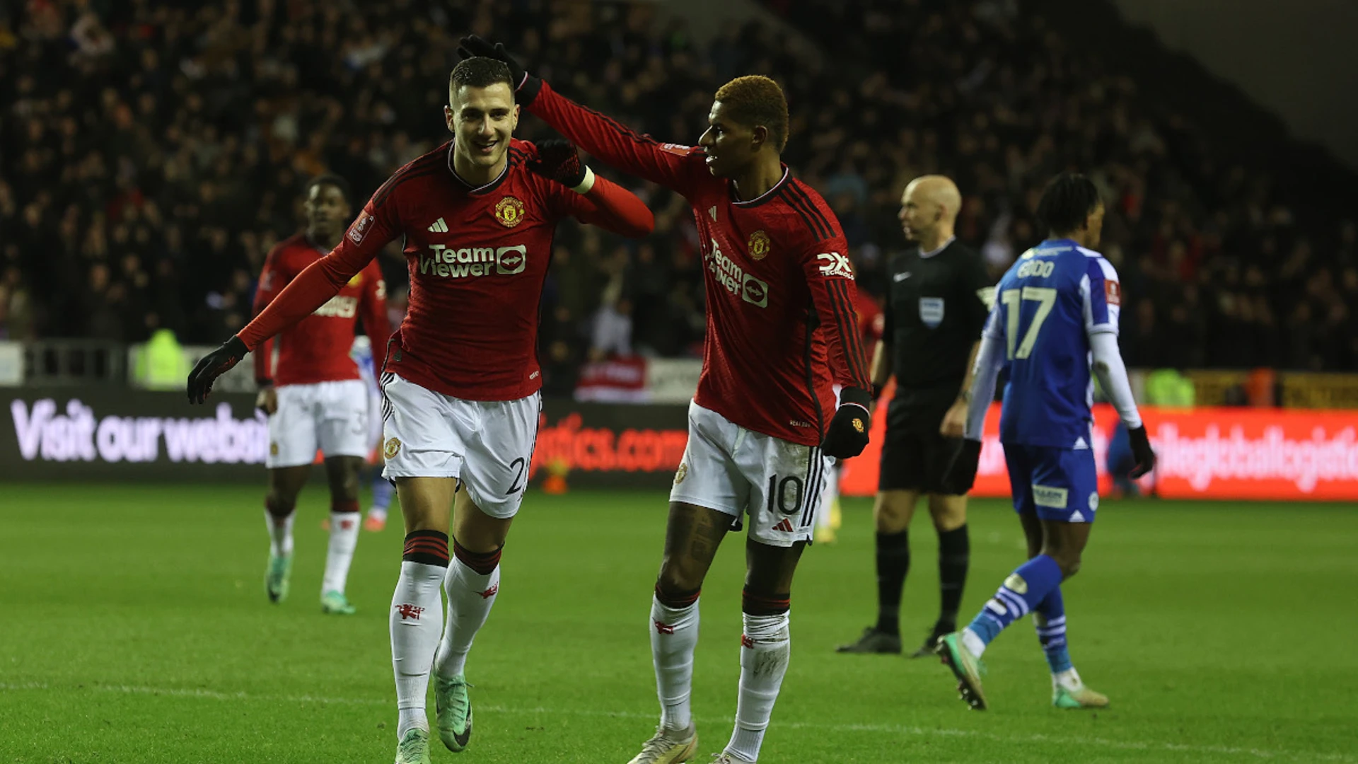 Manchester United avoid FA Cup upset at Wigan