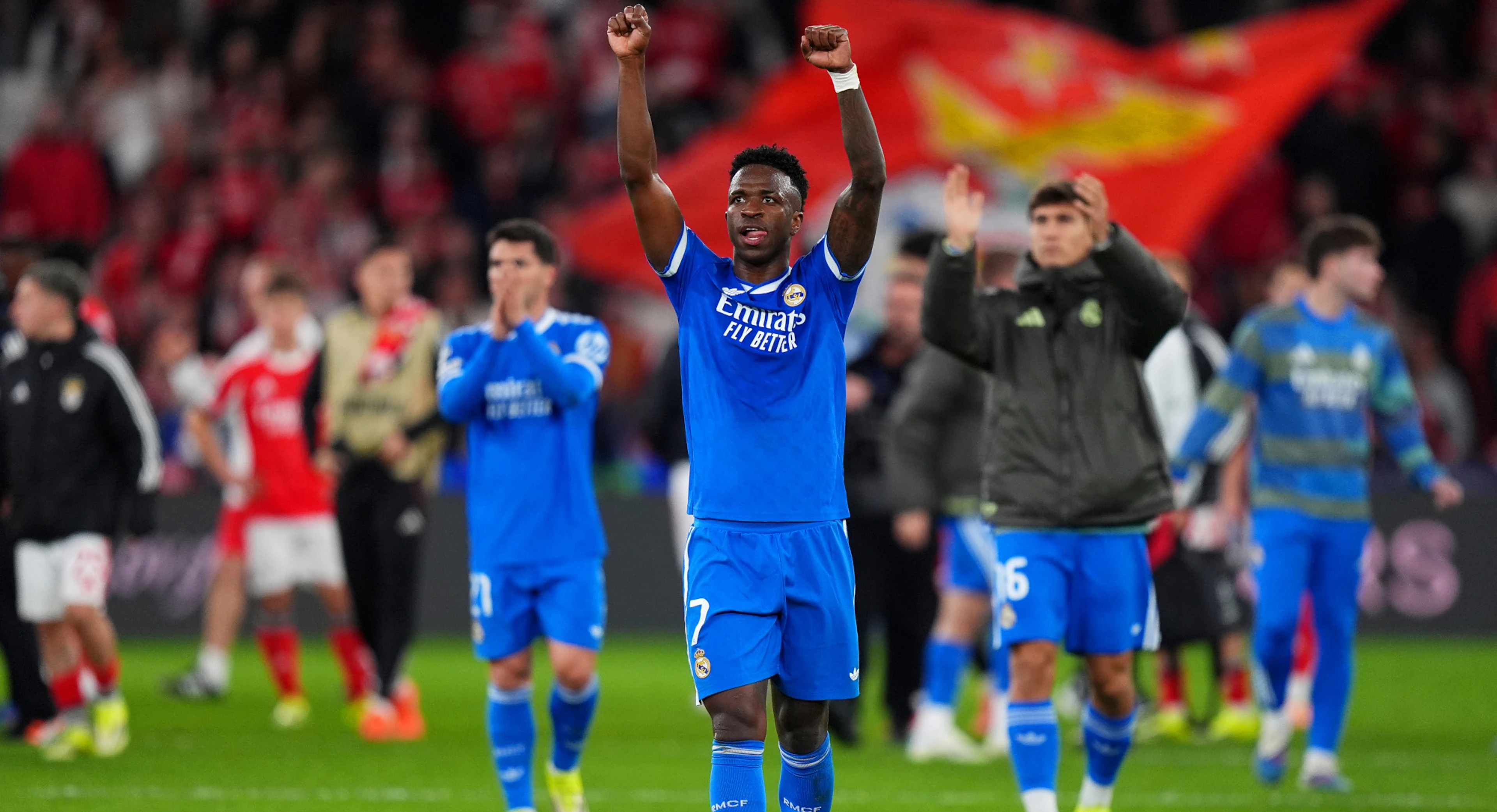 Vinicius stunner helps Real edge Benfica in play-off marred by alleged racism