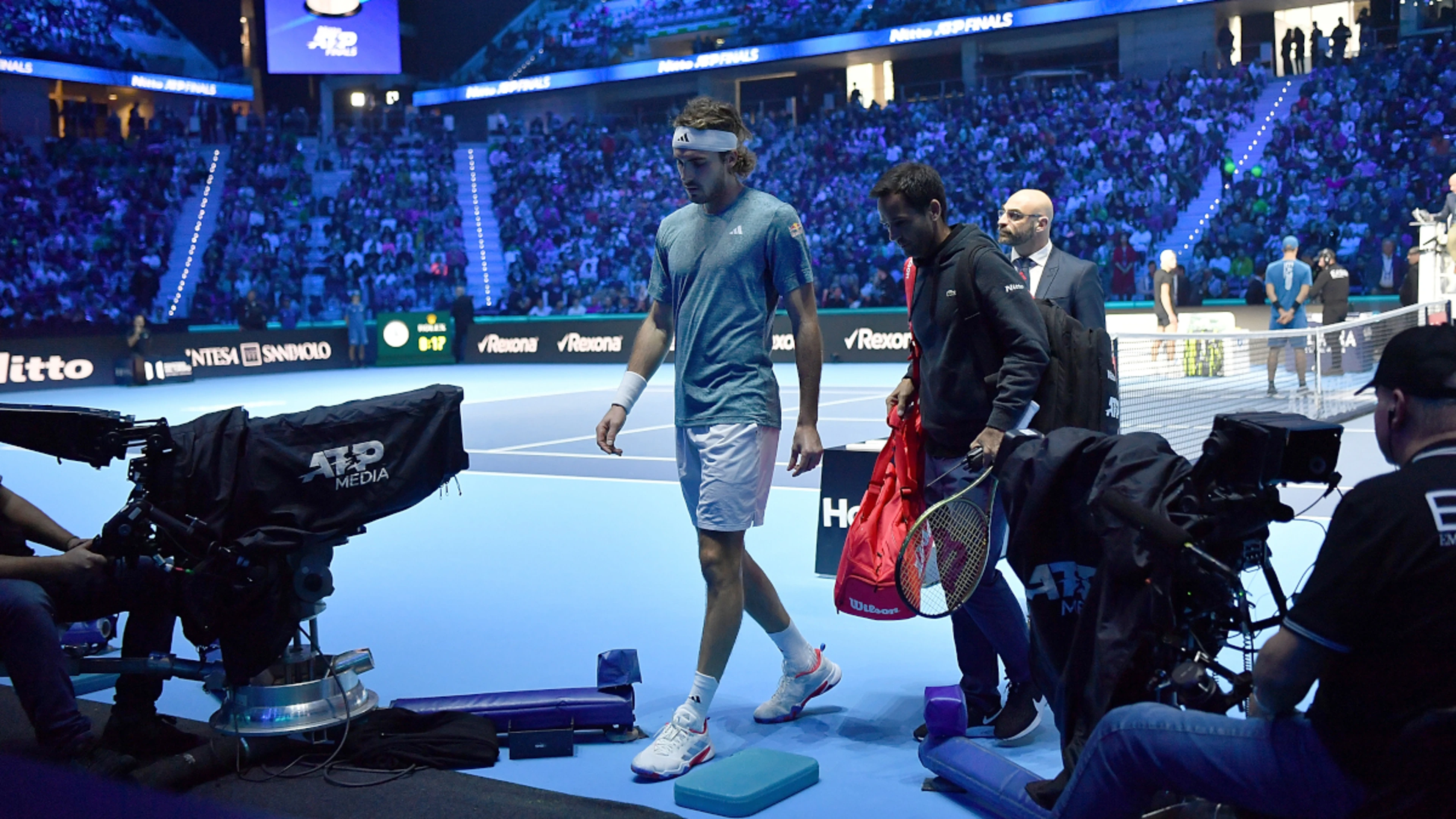 Injured Tsitsipas retires from ATP Finals clash with Rune