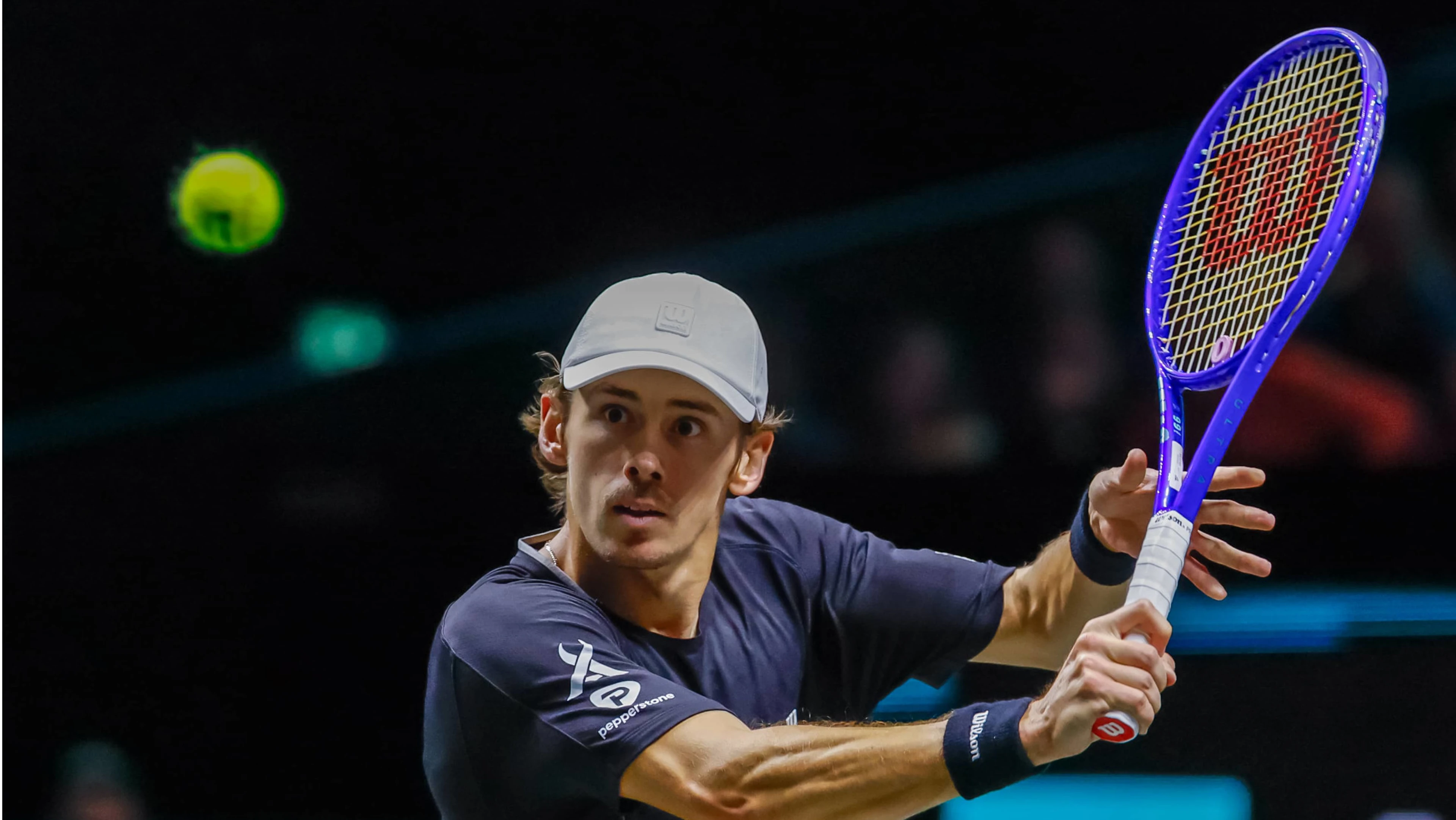De Minaur scraps past local legend Van de Zandschulp