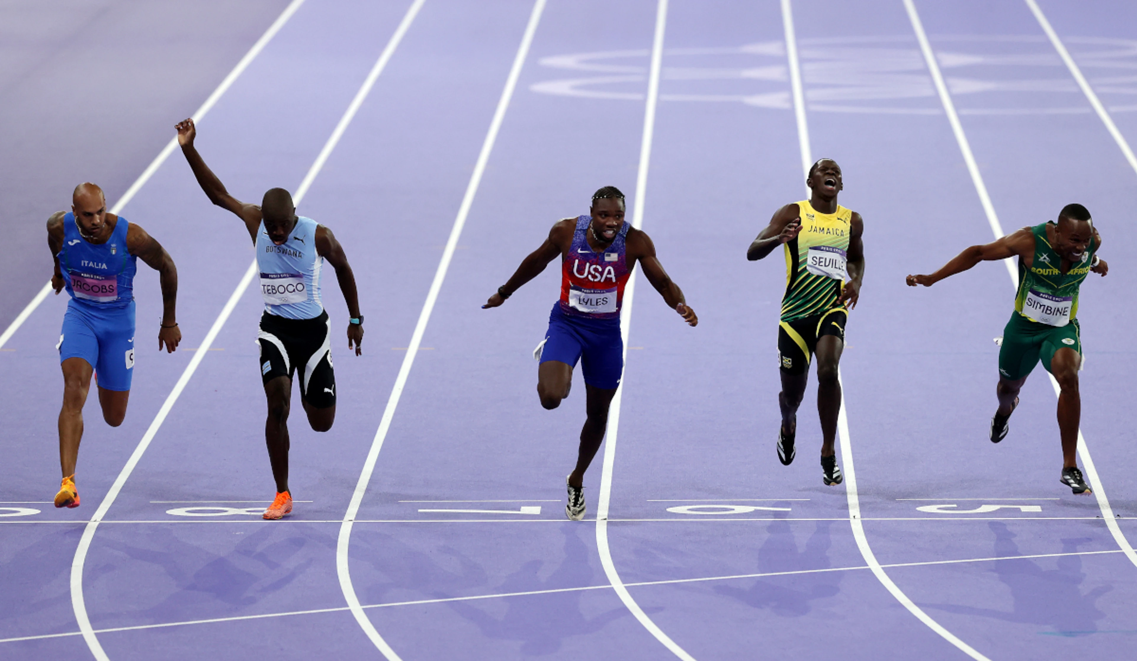 American Lyles wins men's Olympic 100m gold