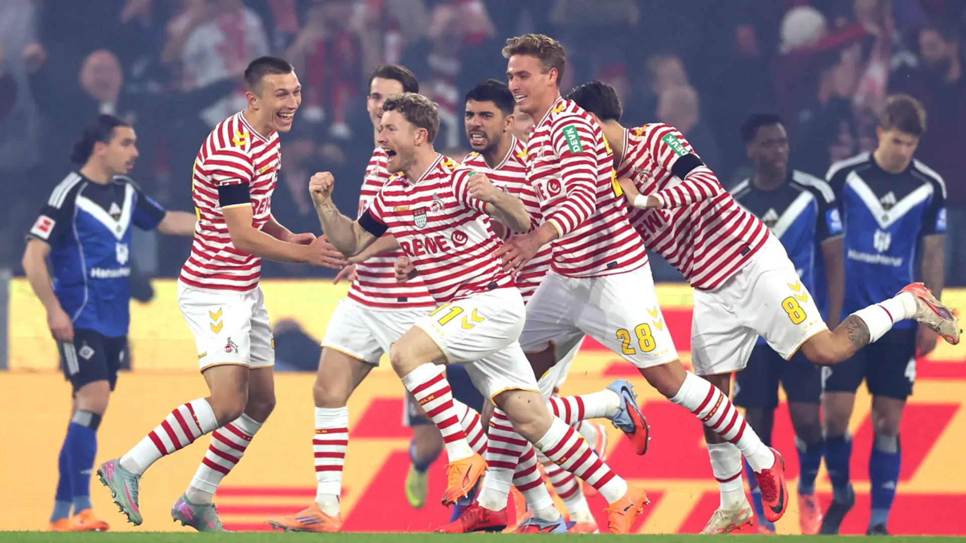 Cologne win as nine-man Hamburg go into meltdown