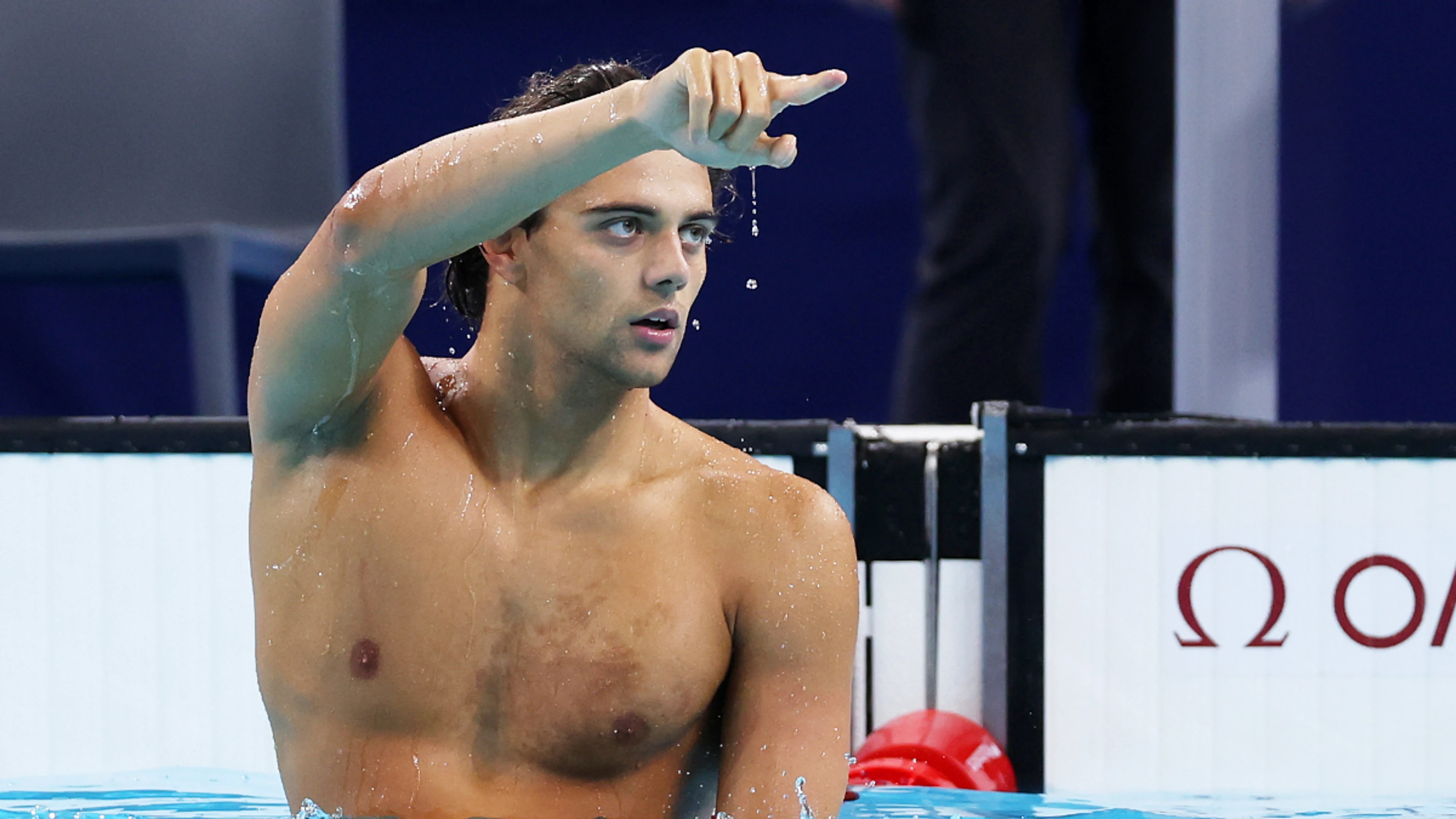 Italy's Thomas Ceccon wins Olympic men's 100m backstroke gold