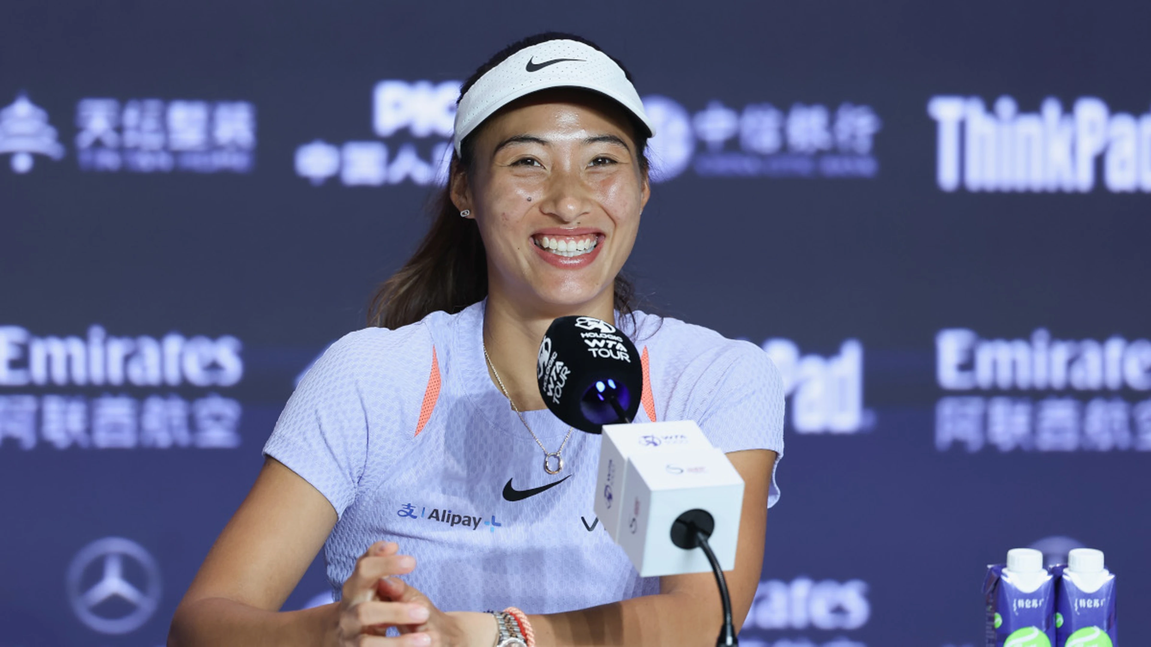 China's Olympic champ Zheng embraces big home expectations