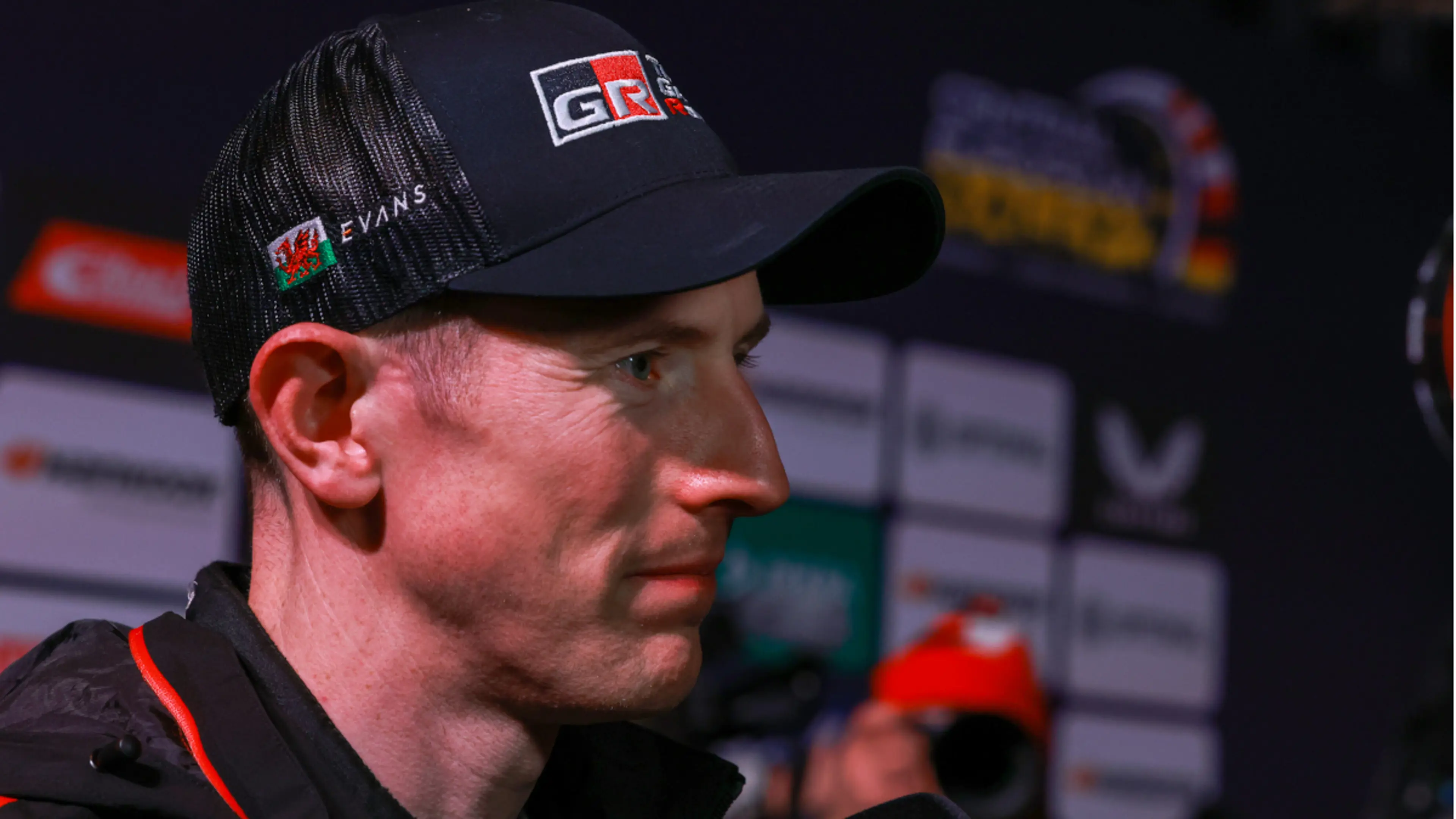 Title-chasing Evans trails Ogier at Rally Japan