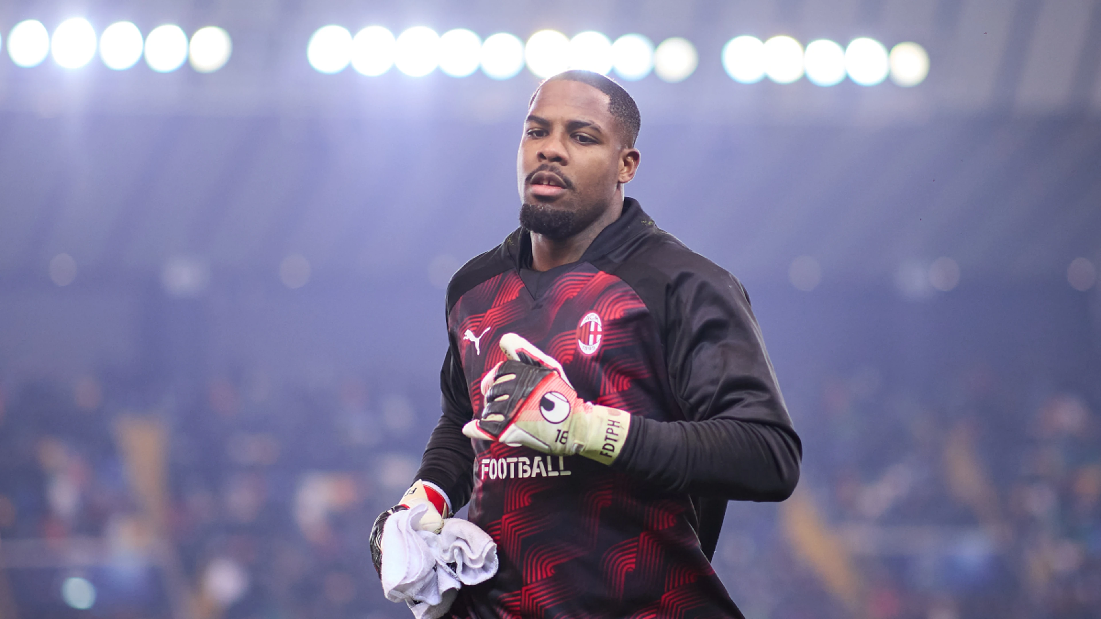 Milan keeper Maignan calls for sanctions to combat racism
