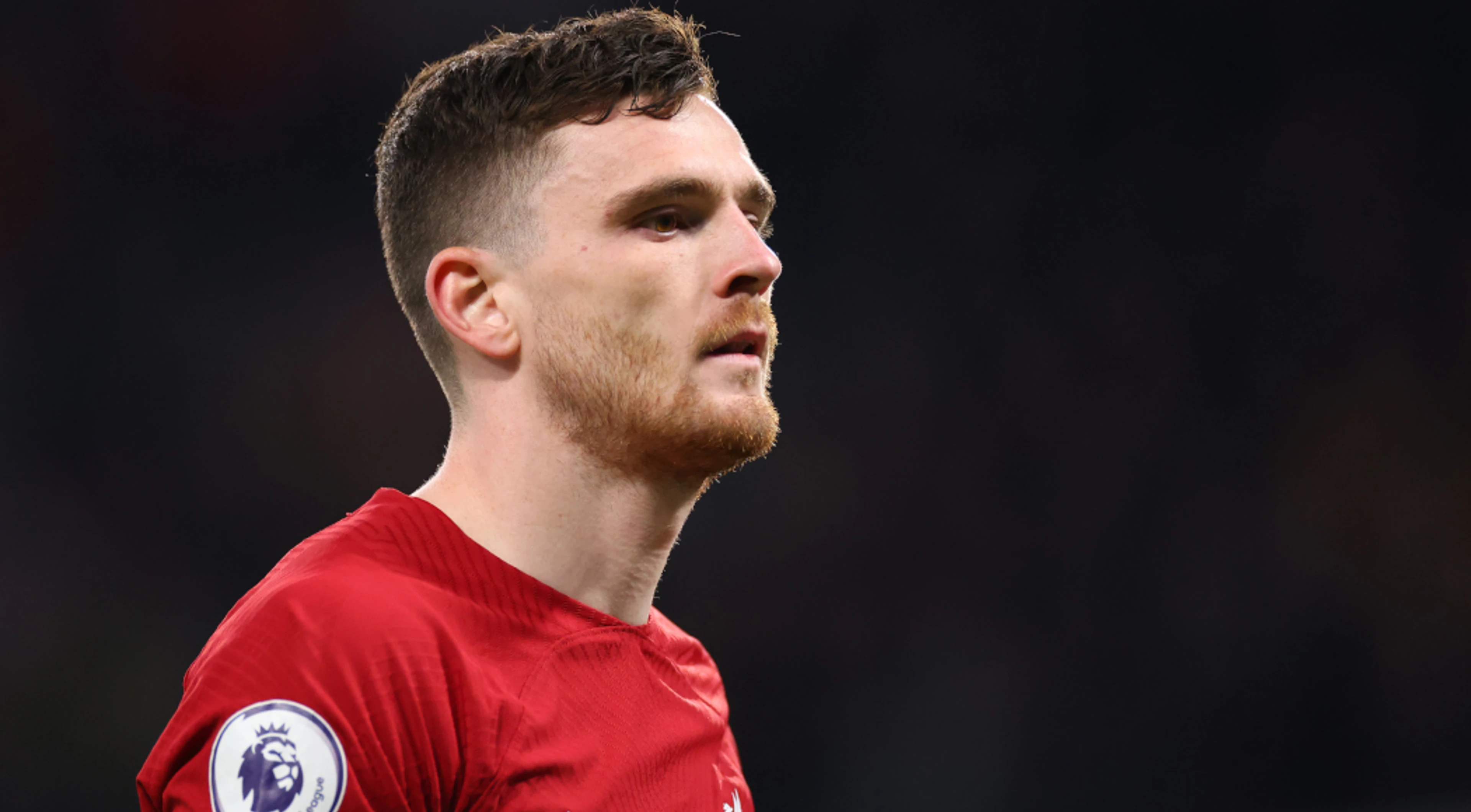 Robertson elbowed by assistant referee