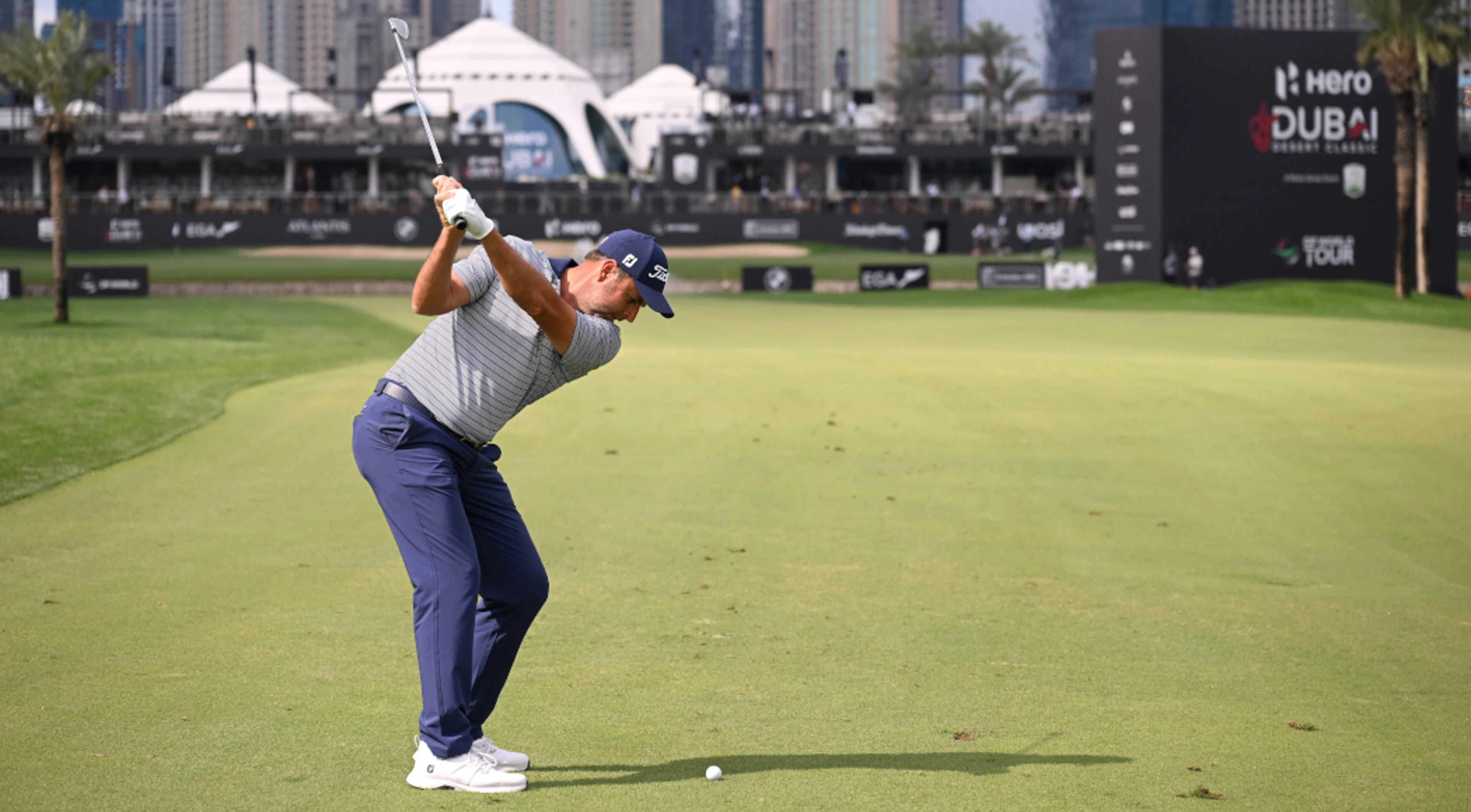 Bland shares Dubai lead as McIlroy heads for driving range