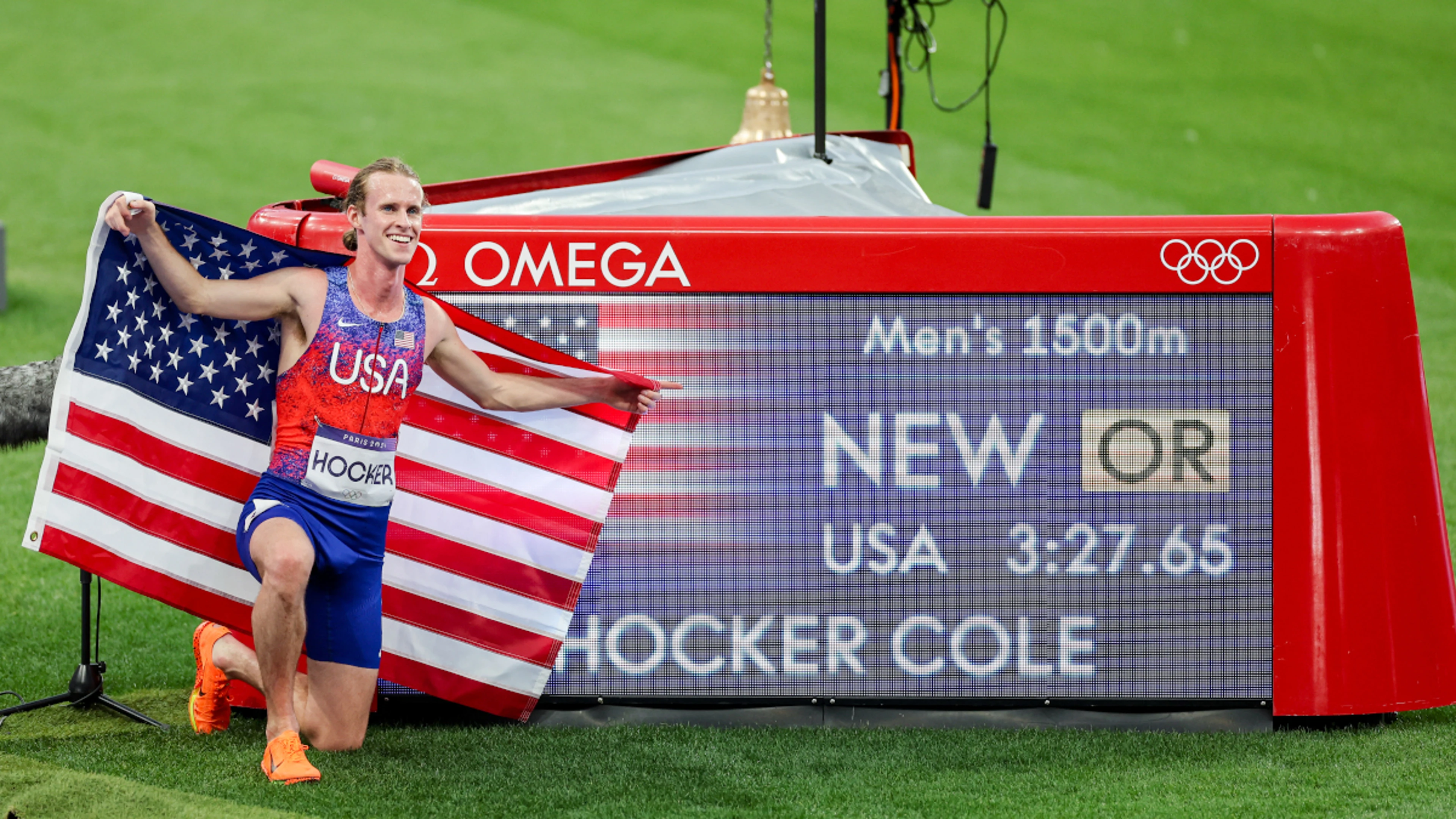 Thomas takes Olympic 200m, Hocker streaks to shock 1500m victory