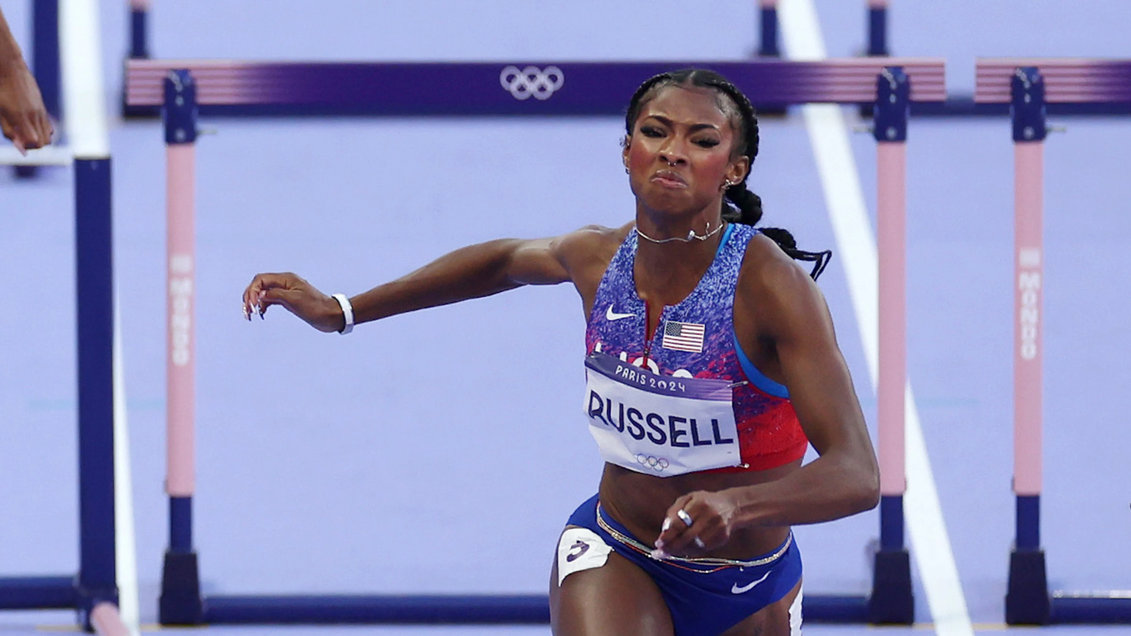 USA's Russell snatches Olympic women's 100m hurdles gold