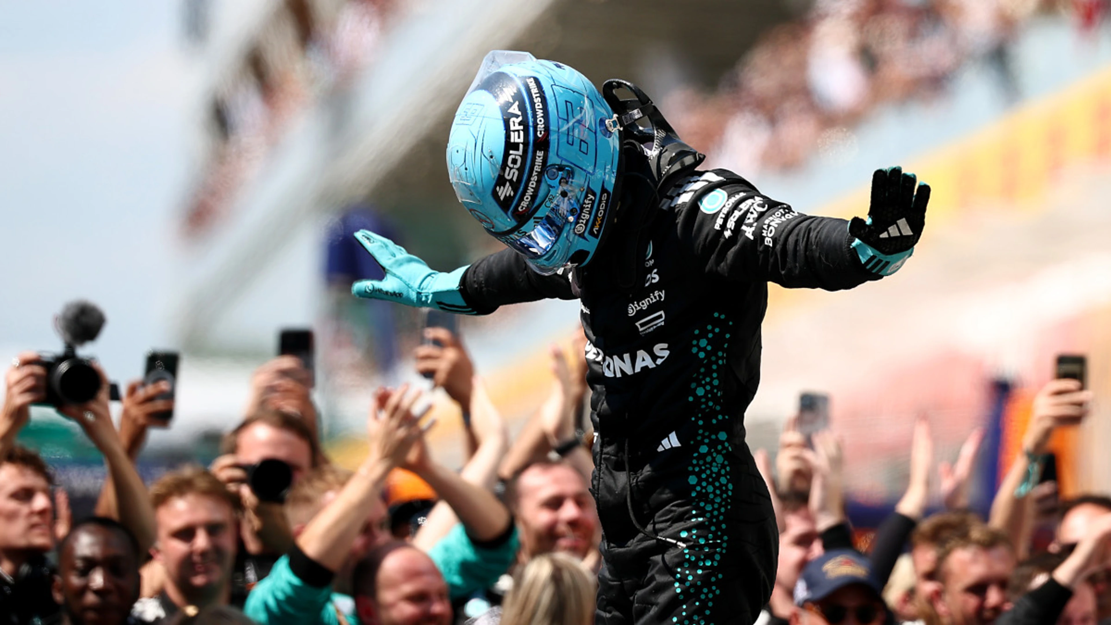 Russell triumphs in Canada as McLaren drivers crash