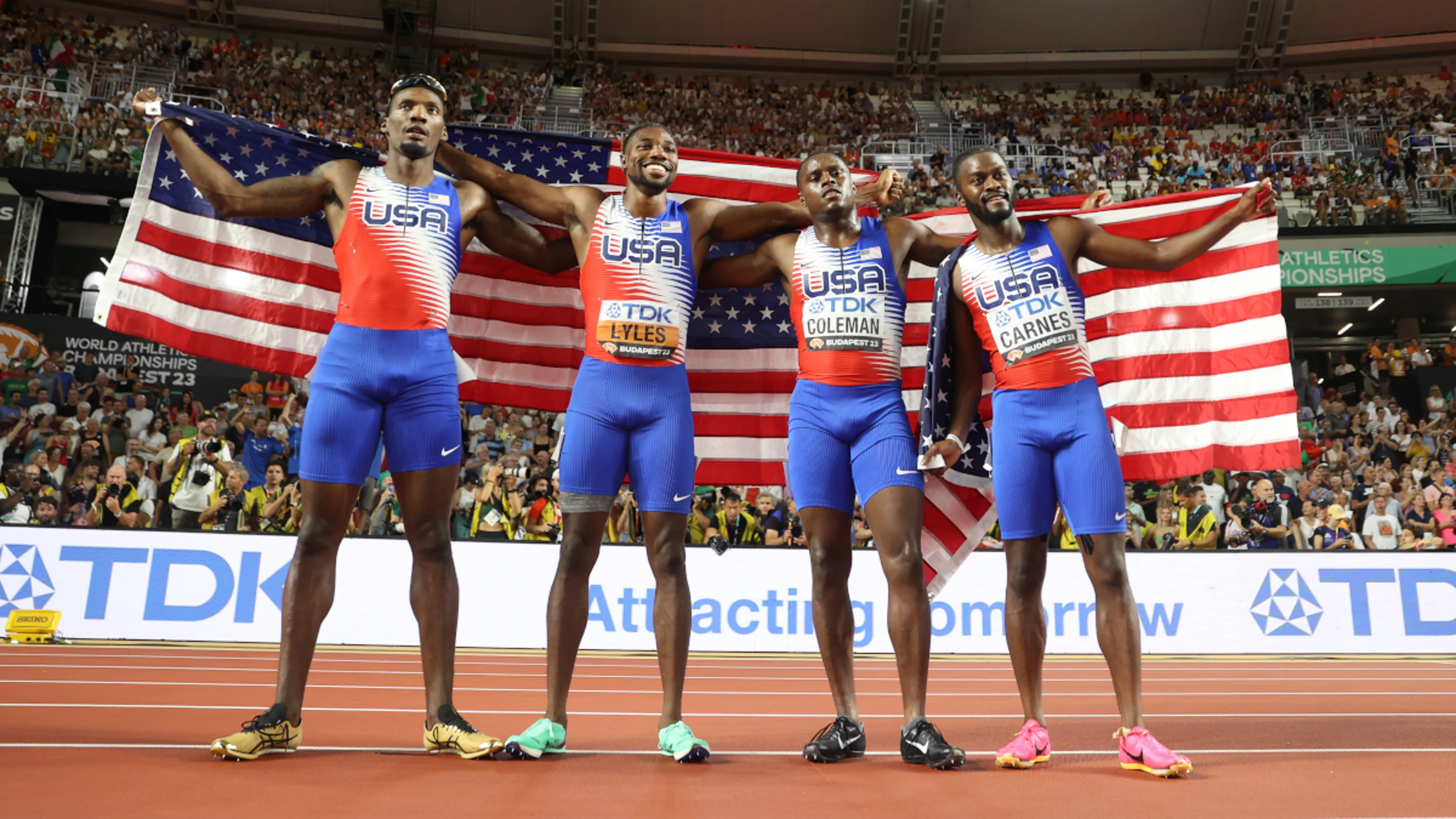 Lyles wins third world gold after anchoring US relay to victory