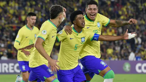 Ten-man Brazil put four past Tunisia to seal quarterfinal berth