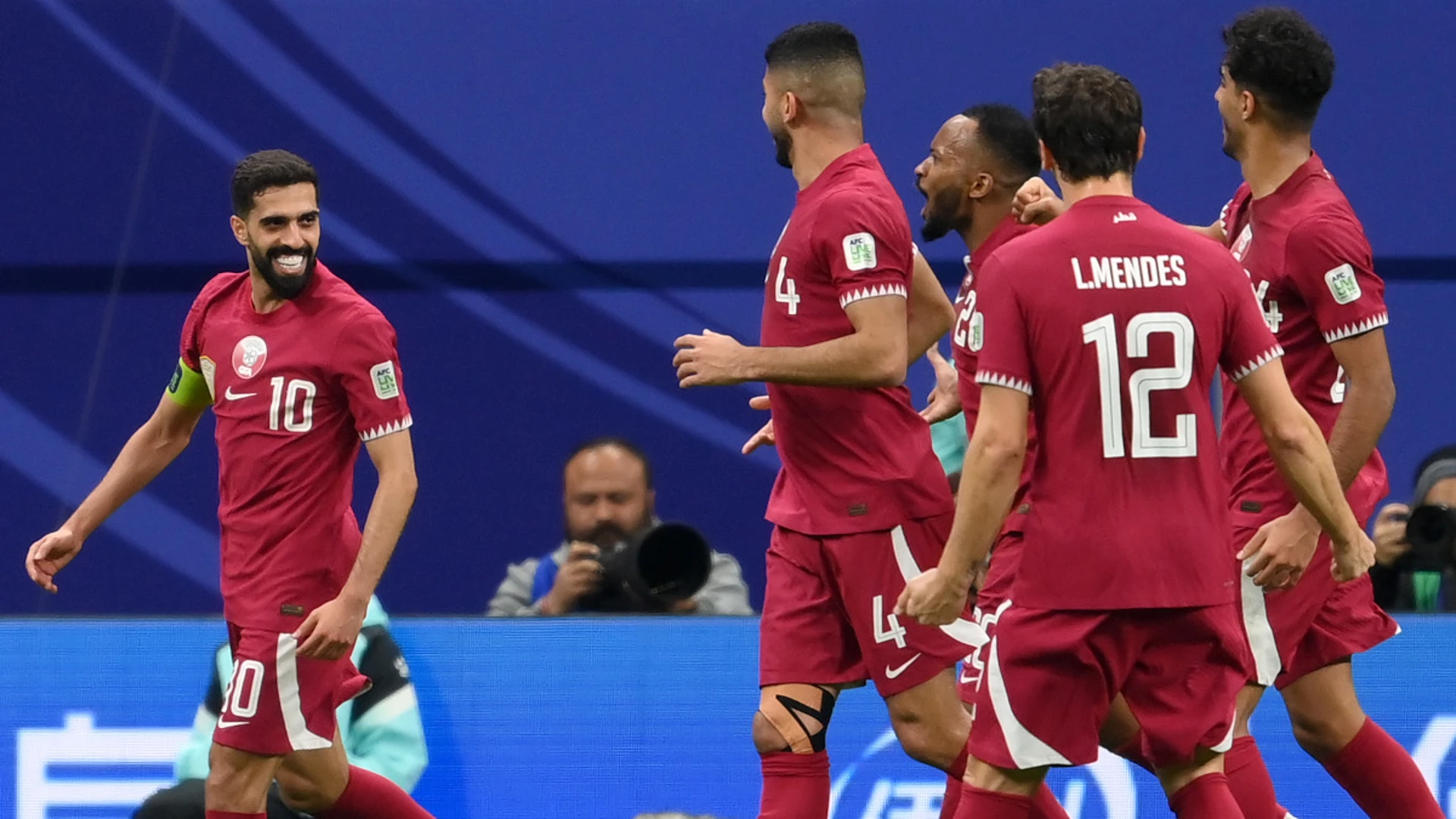 Goalkeeper saves Qatar in shootout to set up Iran semi at Asian Cup