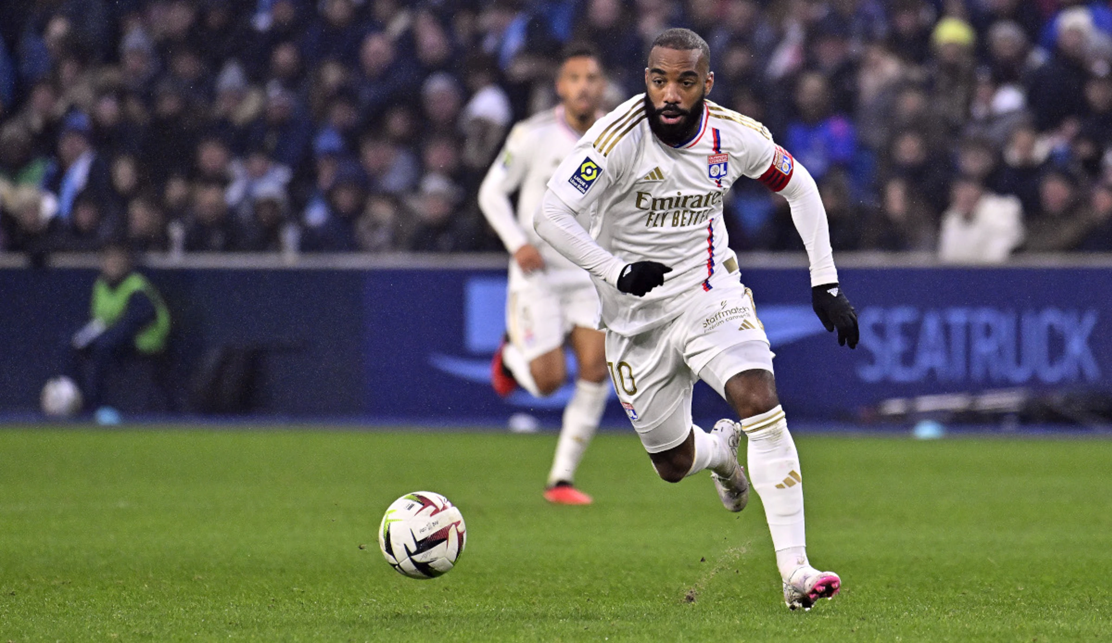 Lacazette lifts struggling Lyon past limping Marseille
