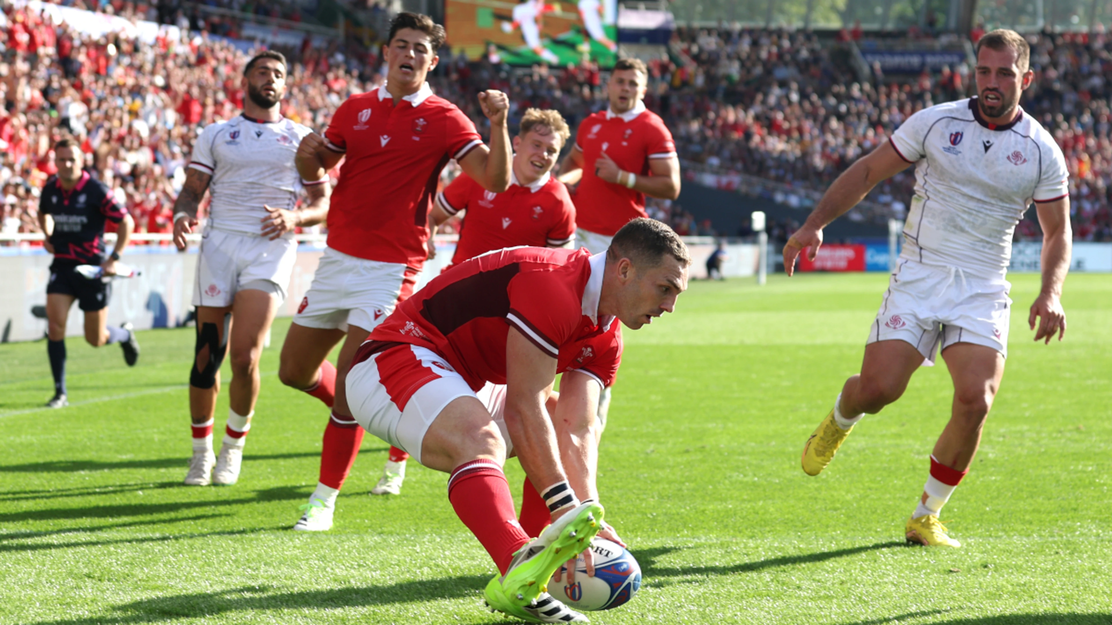 Wales see off fierce Georgia to seal top spot