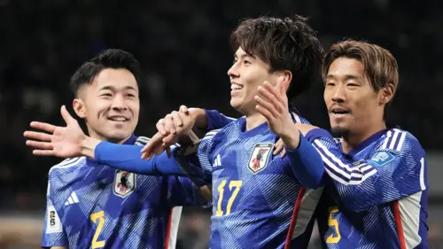 Japan advance in World Cup qualifying with forfeit win over North Korea