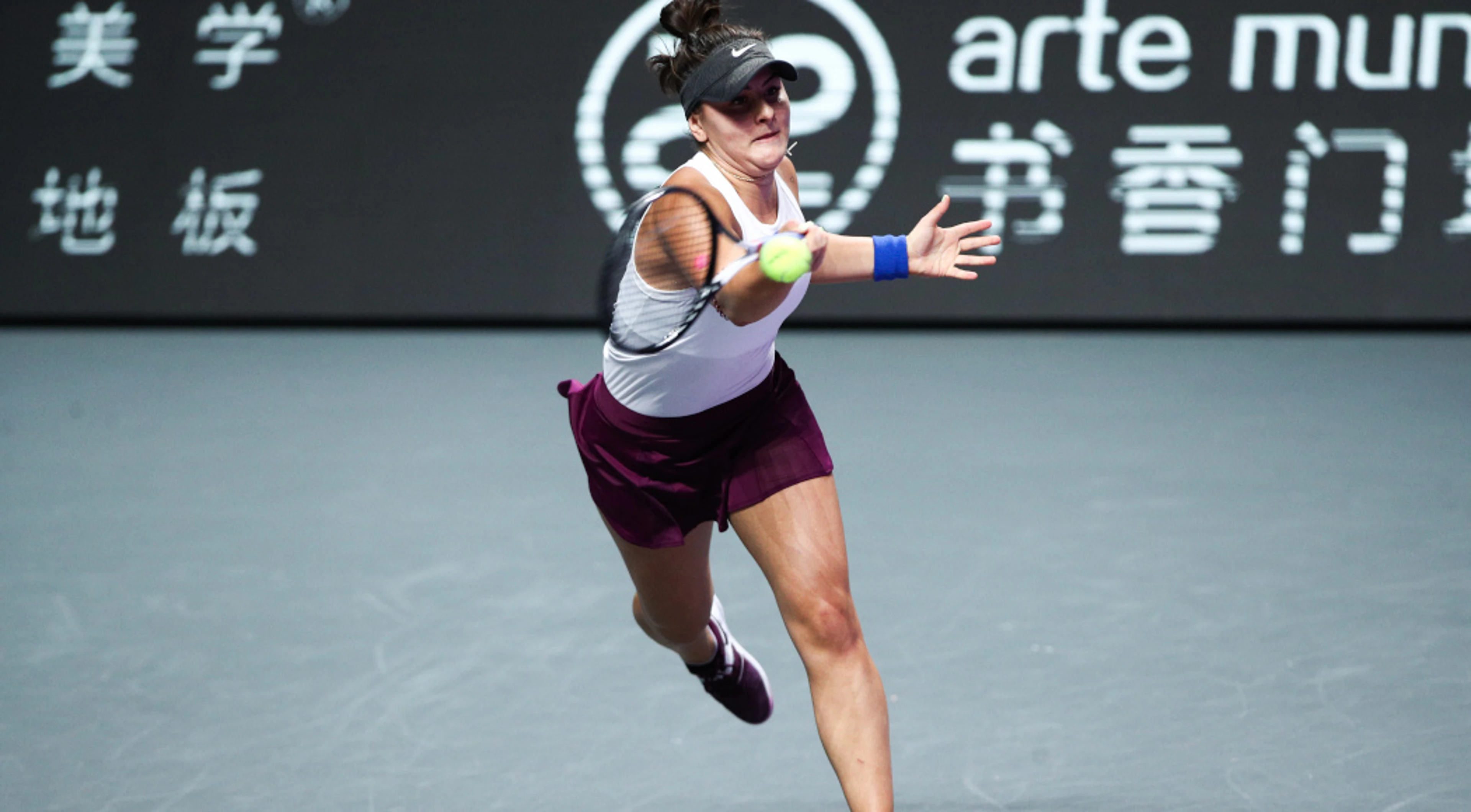 Andreescu beats Raducanu to advance in Miami