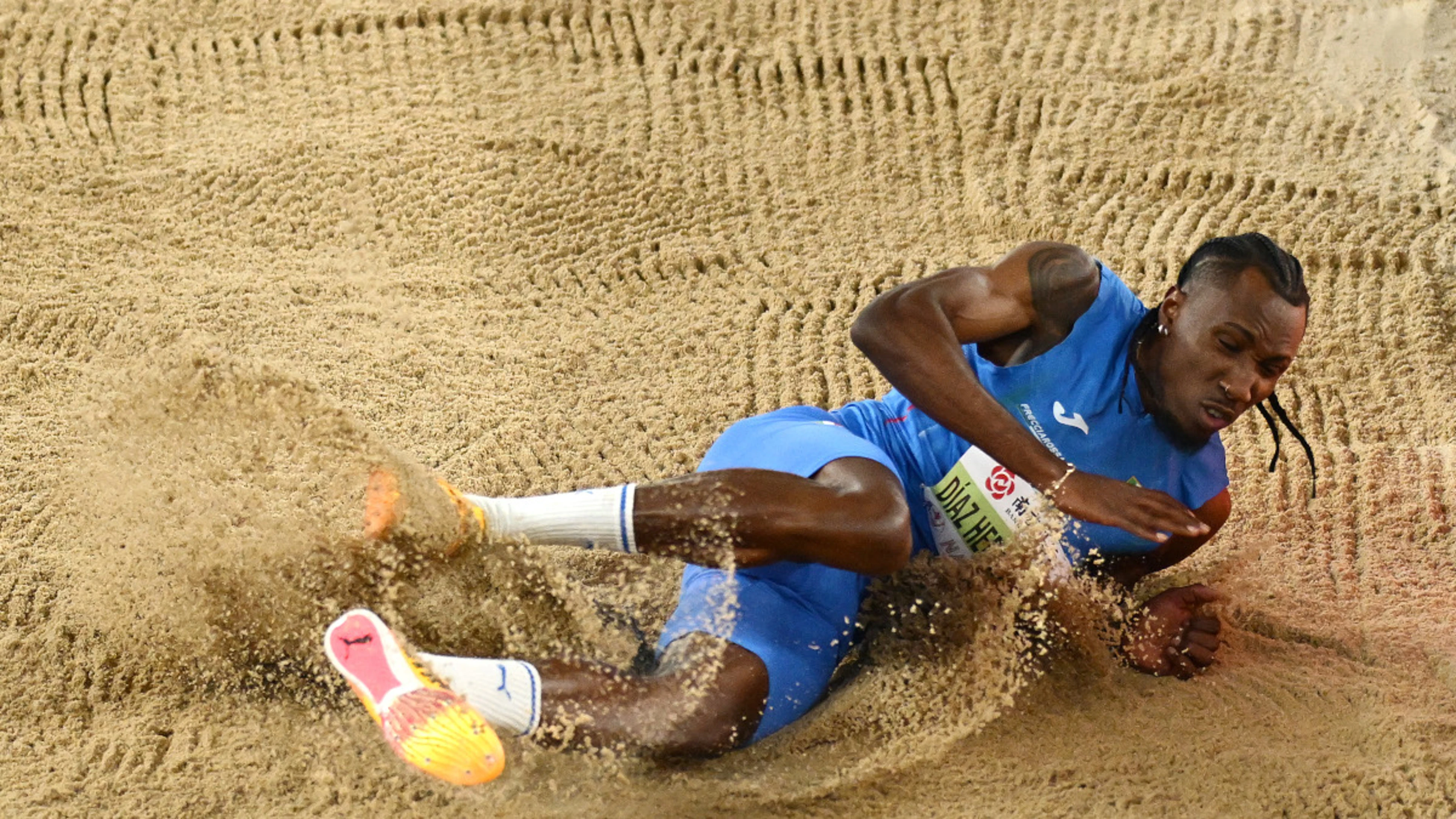 Italy's Diaz dominates triple jump for opening world indoor gold