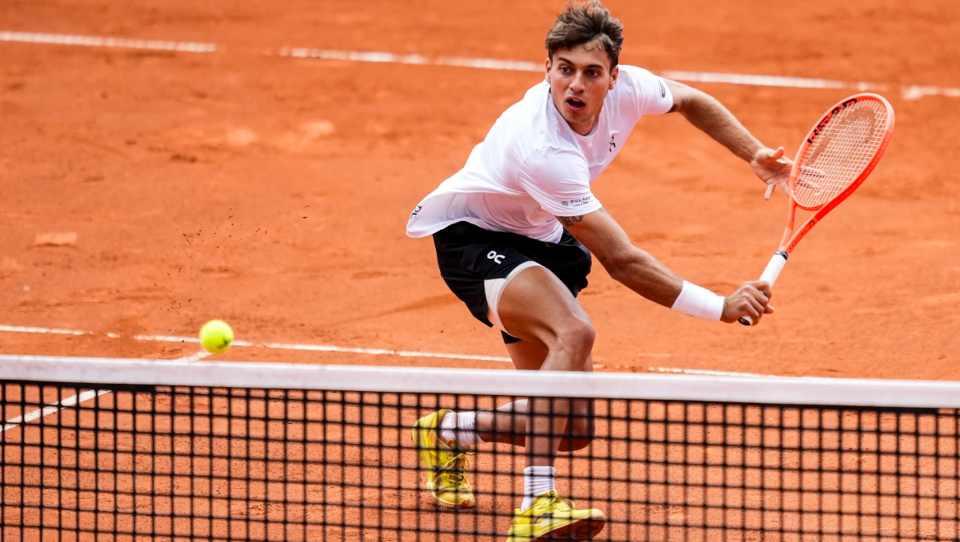 Cobolli into Hamburg final after comeback win over Etcheverry