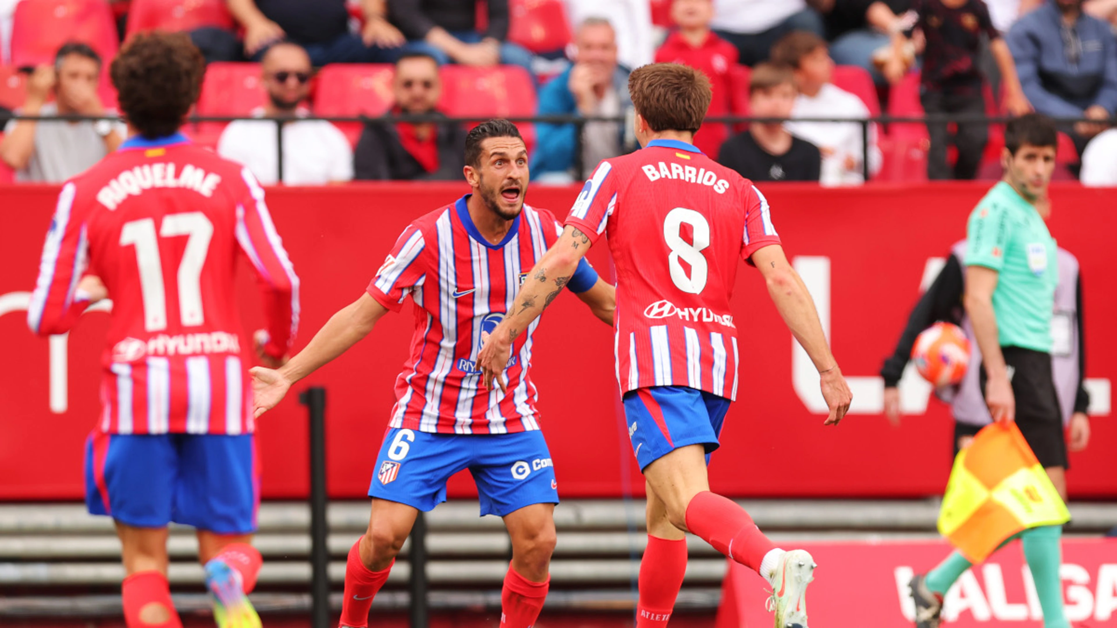 Barrios grabs Atletico late win at Sevilla