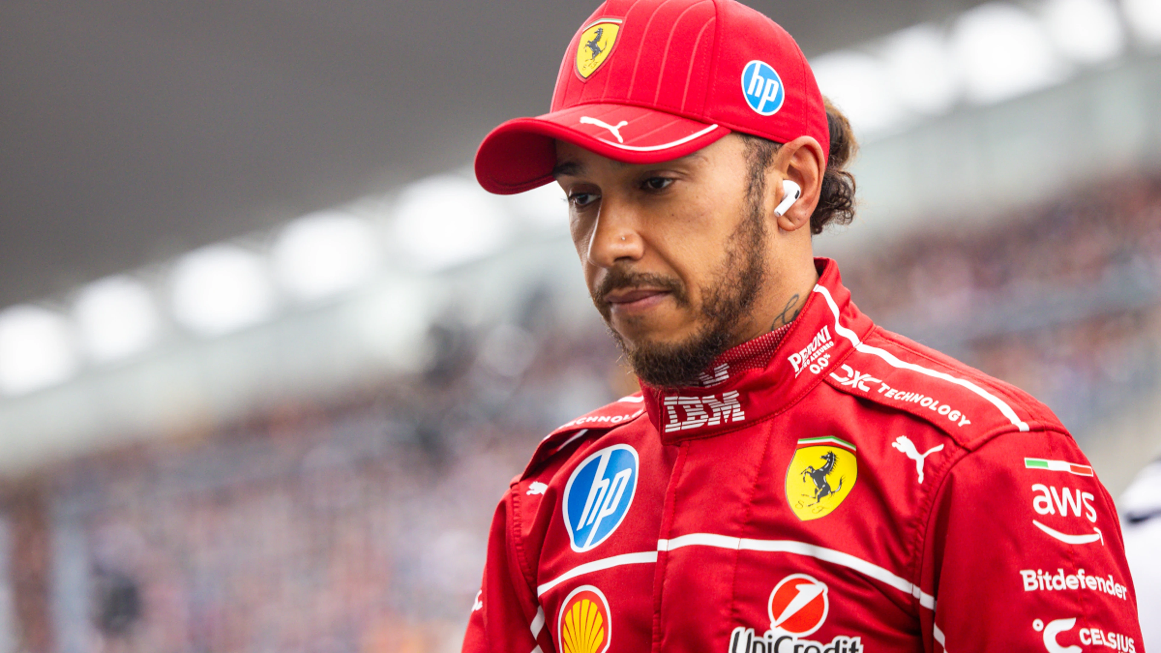 Hamilton says Ferrari still off the pace in Japan