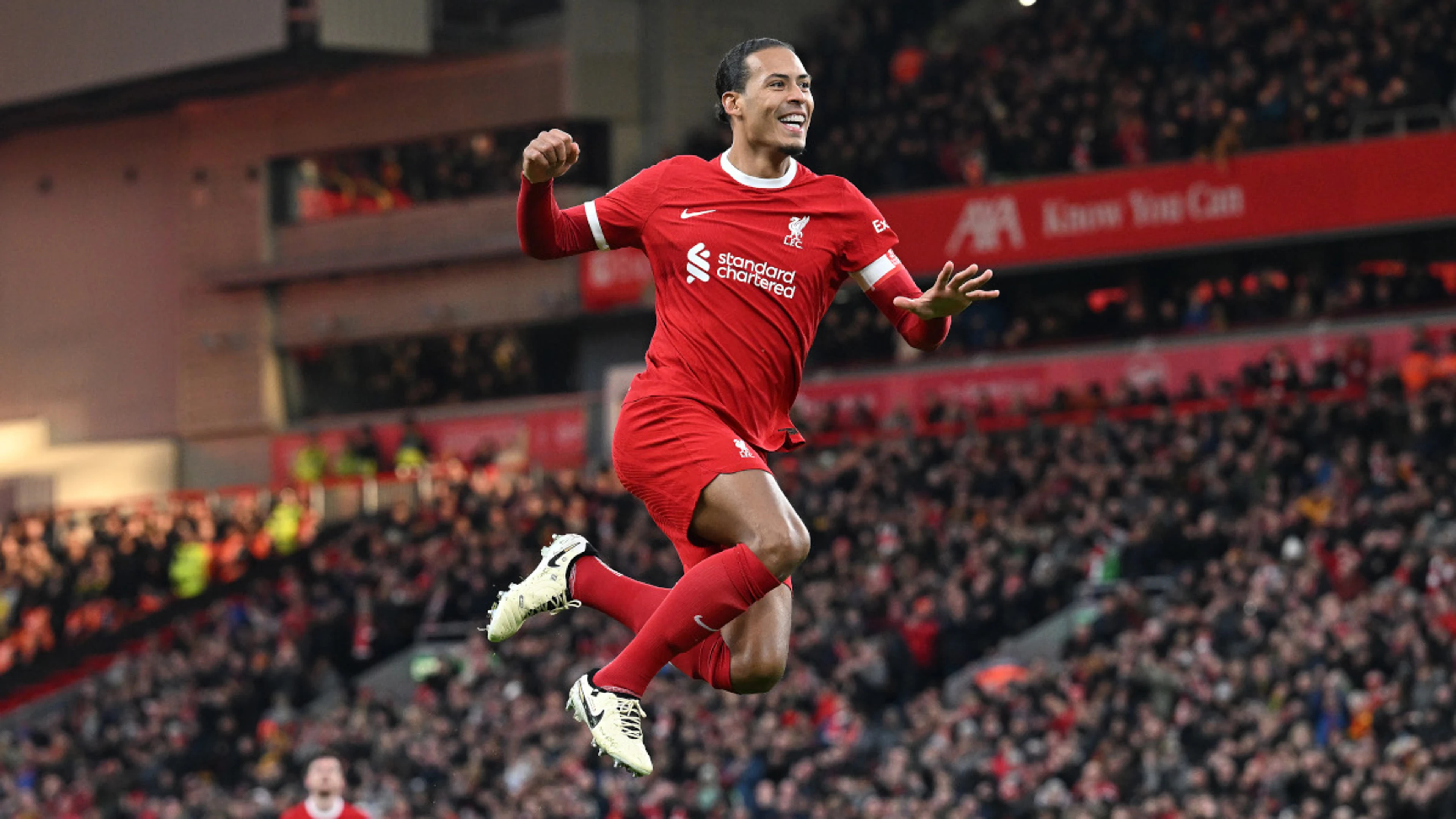 Liverpool through to FA Cup fifth round, Wolves win game marked by fan violence