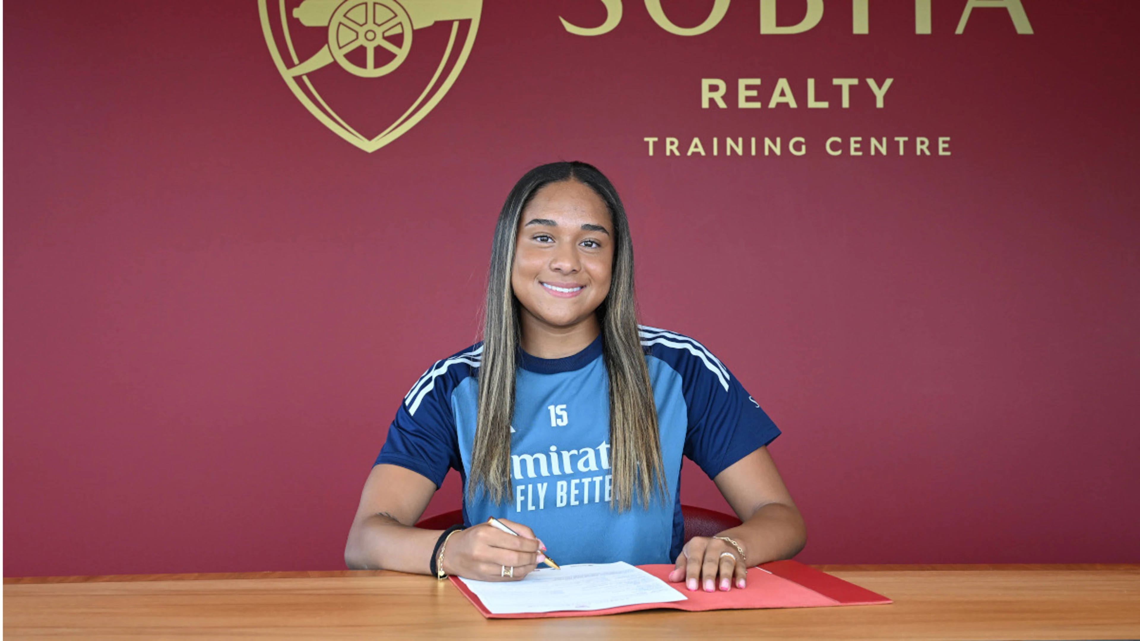 Arsenal sign Liverpool's Smith in women's world record deal