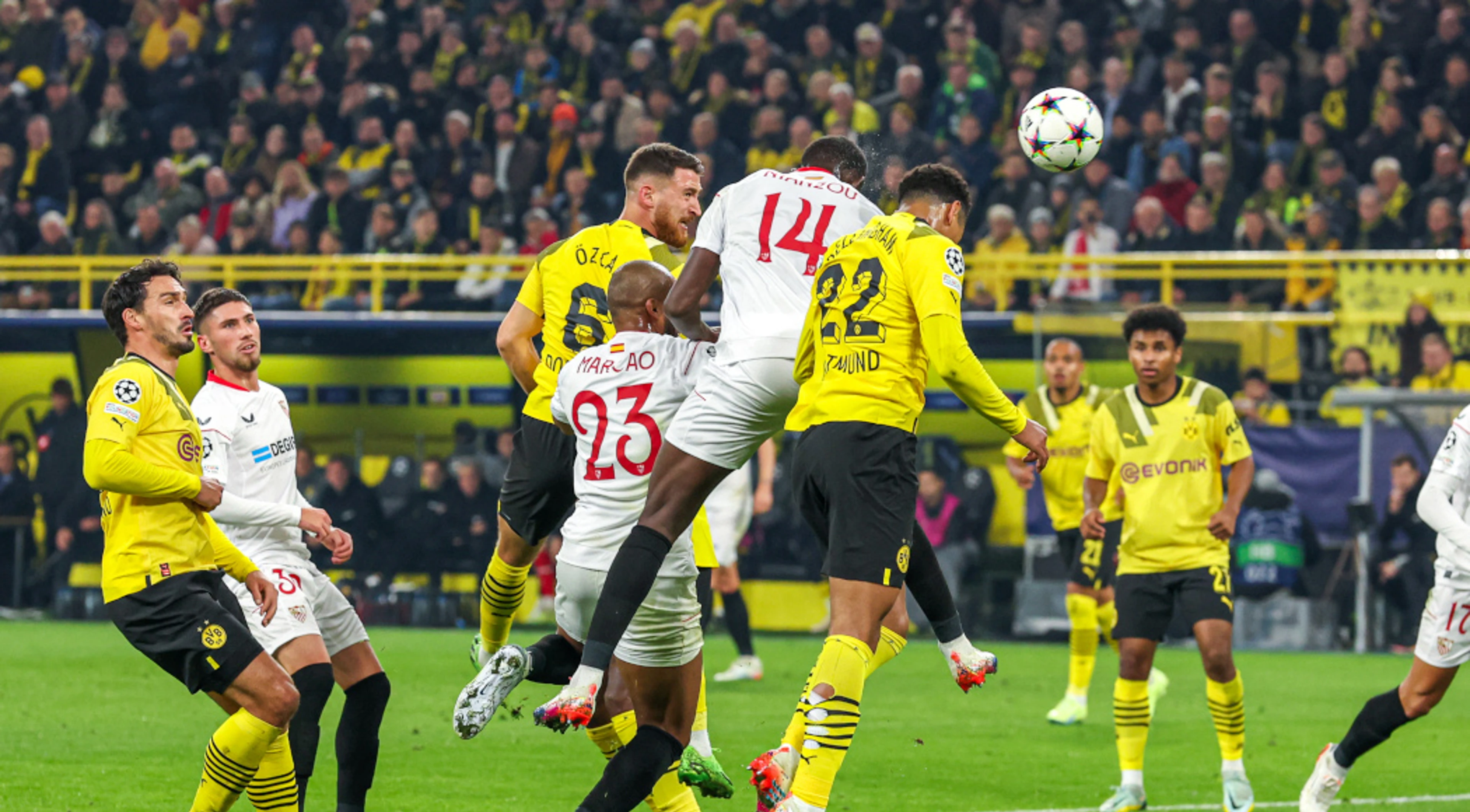 Dortmund draw with Sevilla, Manchester City go through