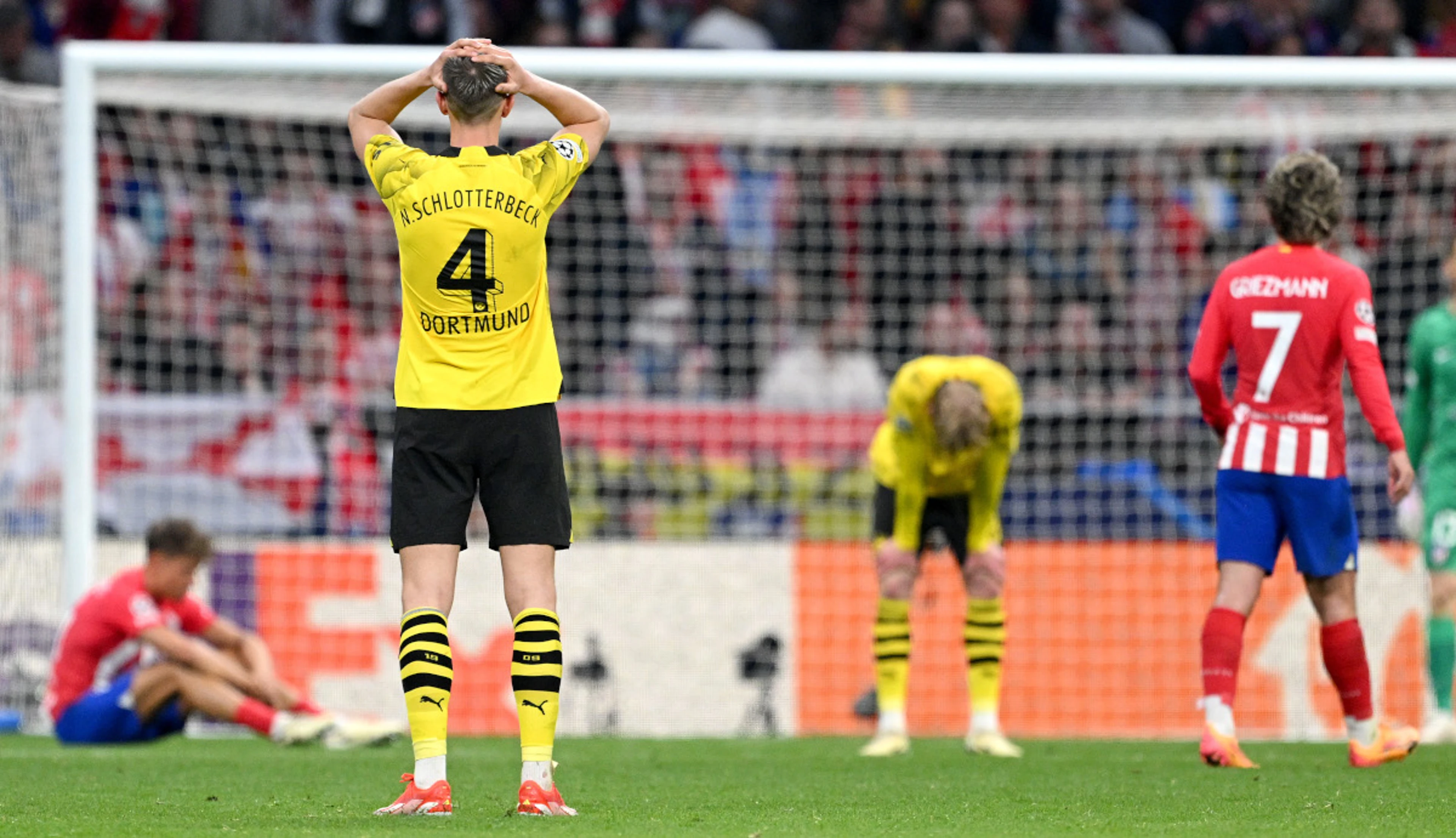 Atletico hold on to keep advantage on Dortmund