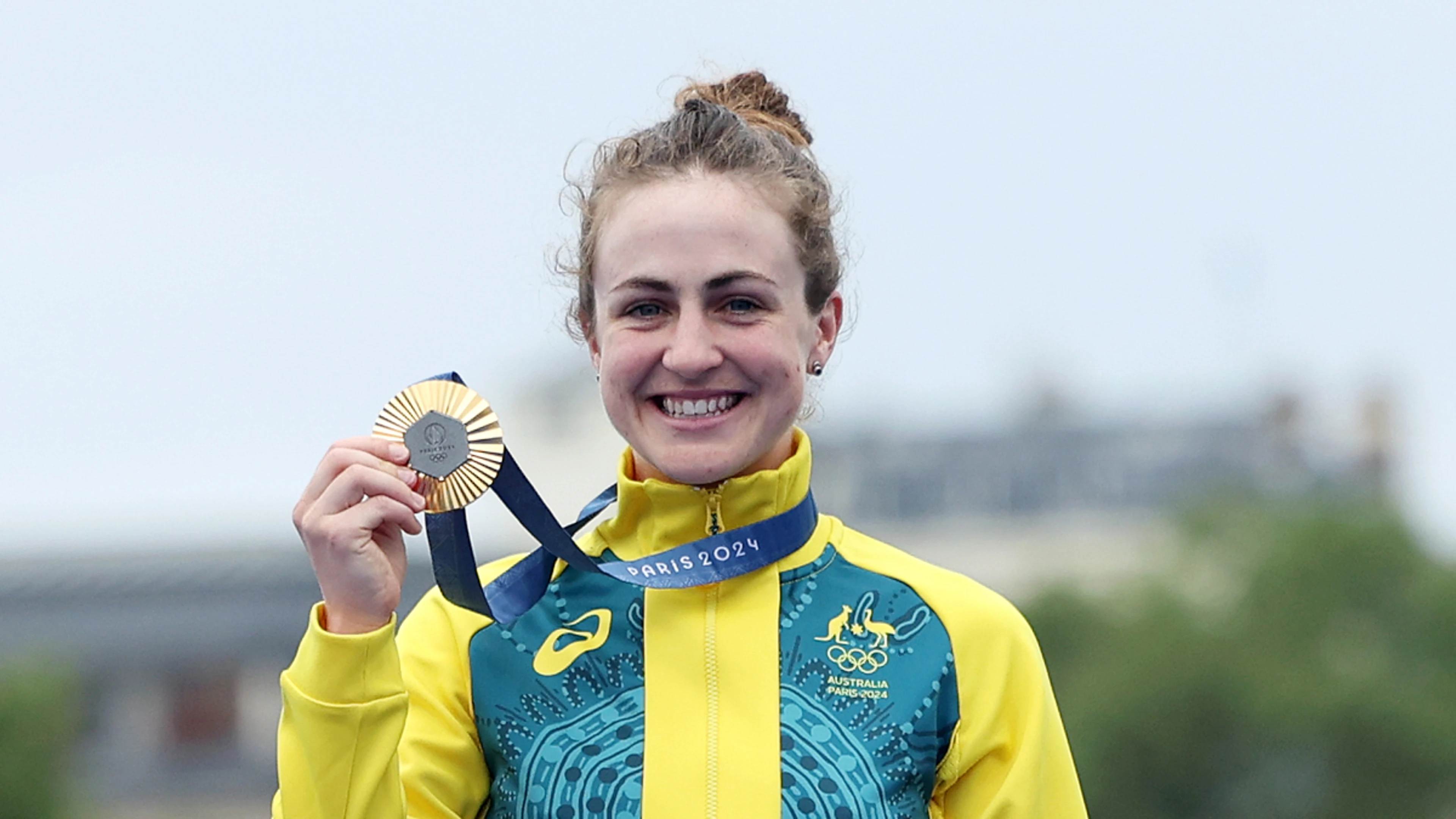 Australia's Brown defies rain for Olympic time-trial gold