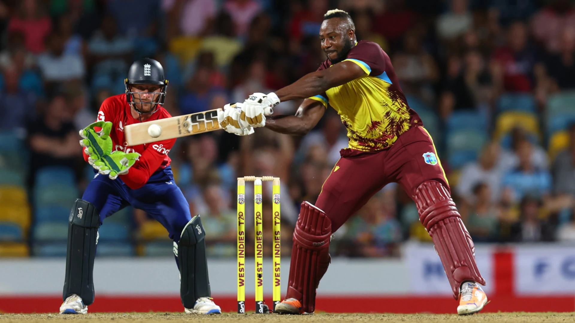 Recalled Russell shines as West Indies beat England in first T20