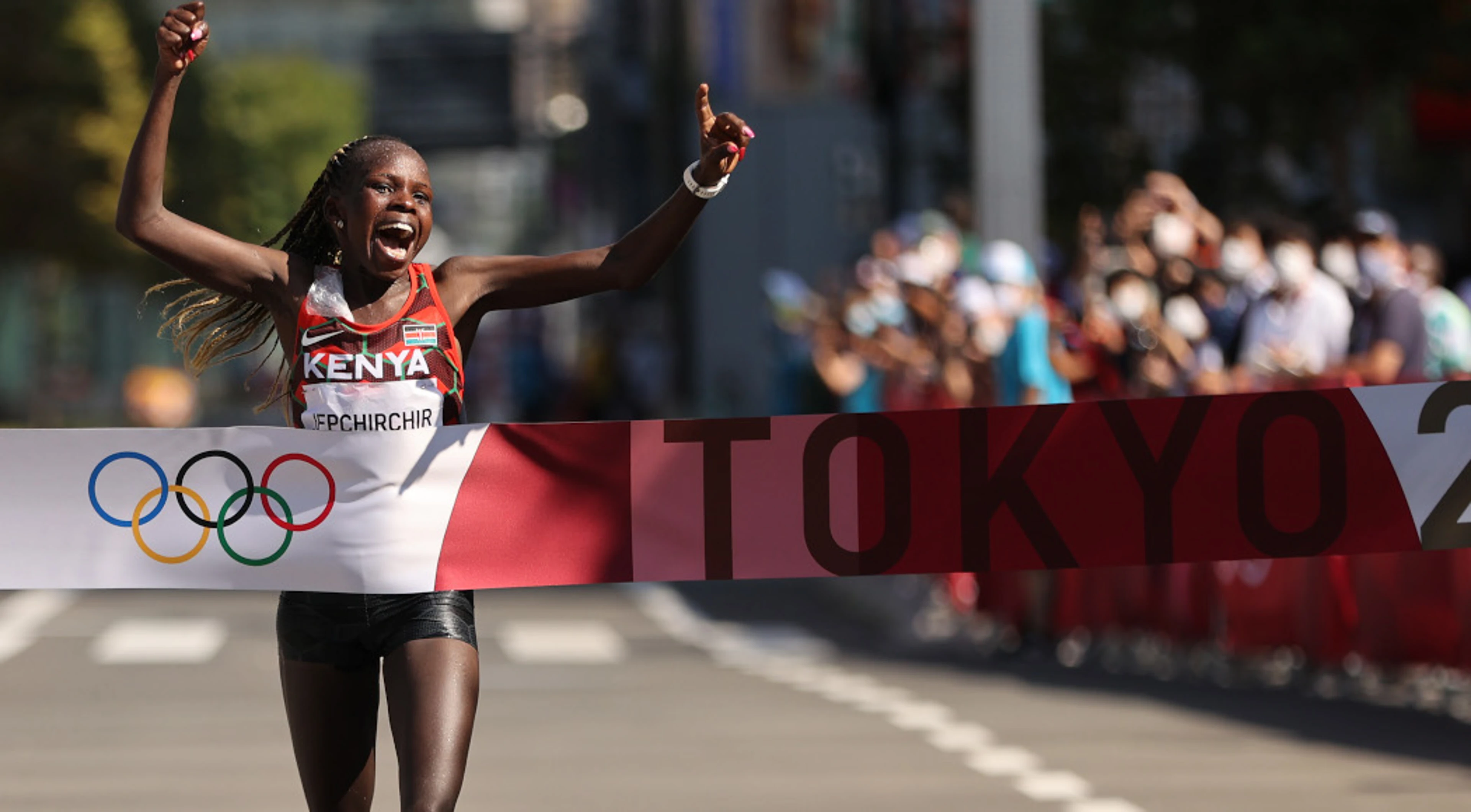 Spectators come out to cheer on marathon runners
