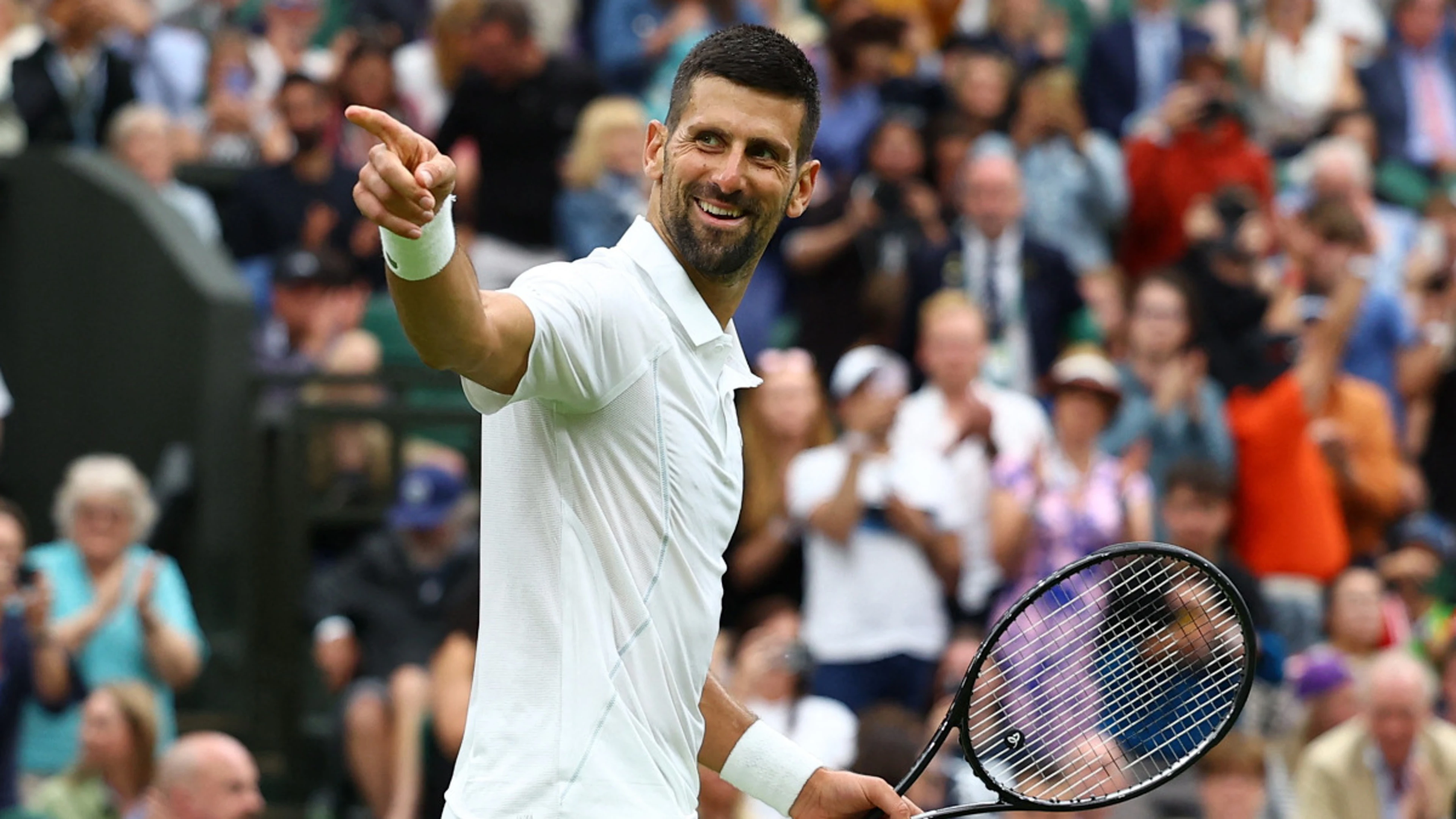 Djokovic 100 not out, into fourth round at Wimbledon